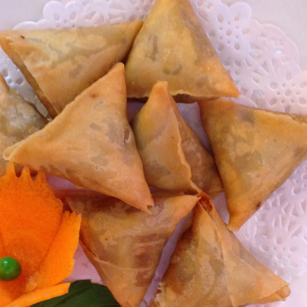 Order A17. Triangle Curry Puff food online from Basil rice store, Brookline on bringmethat.com
