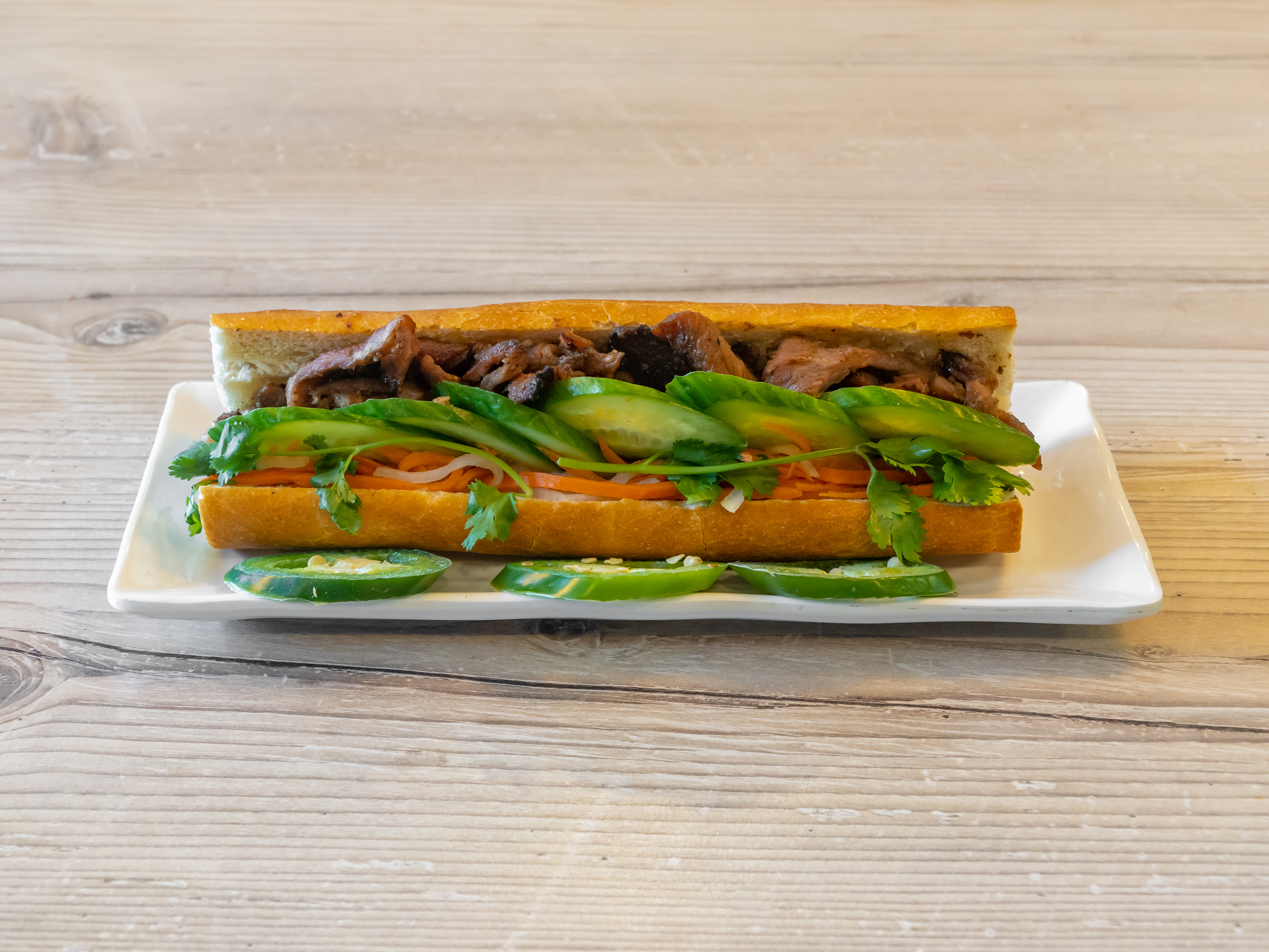 Order SP. BBQ Pork Sandwich food online from Vietnam Kitchen store, Arcadia on bringmethat.com