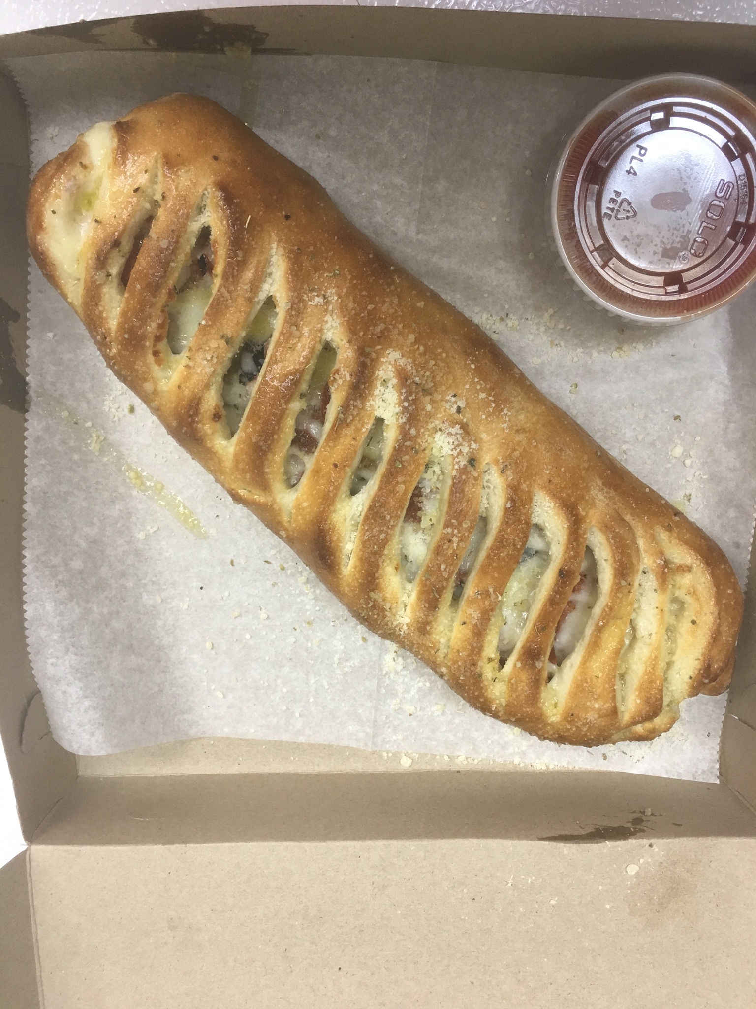Order Deluxe Stromboli food online from Sal’s NY Slice Pizzeria store, Virginia Beach on bringmethat.com