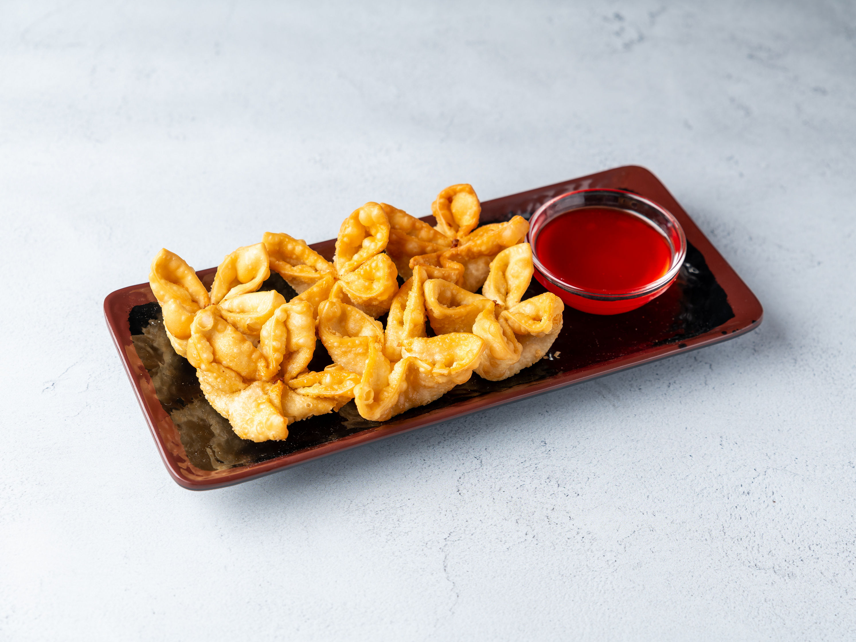 Order 6 Pieces Fried Crab Cheese Wontons food online from Shanghai Kitchen store, Greenwood Village on bringmethat.com