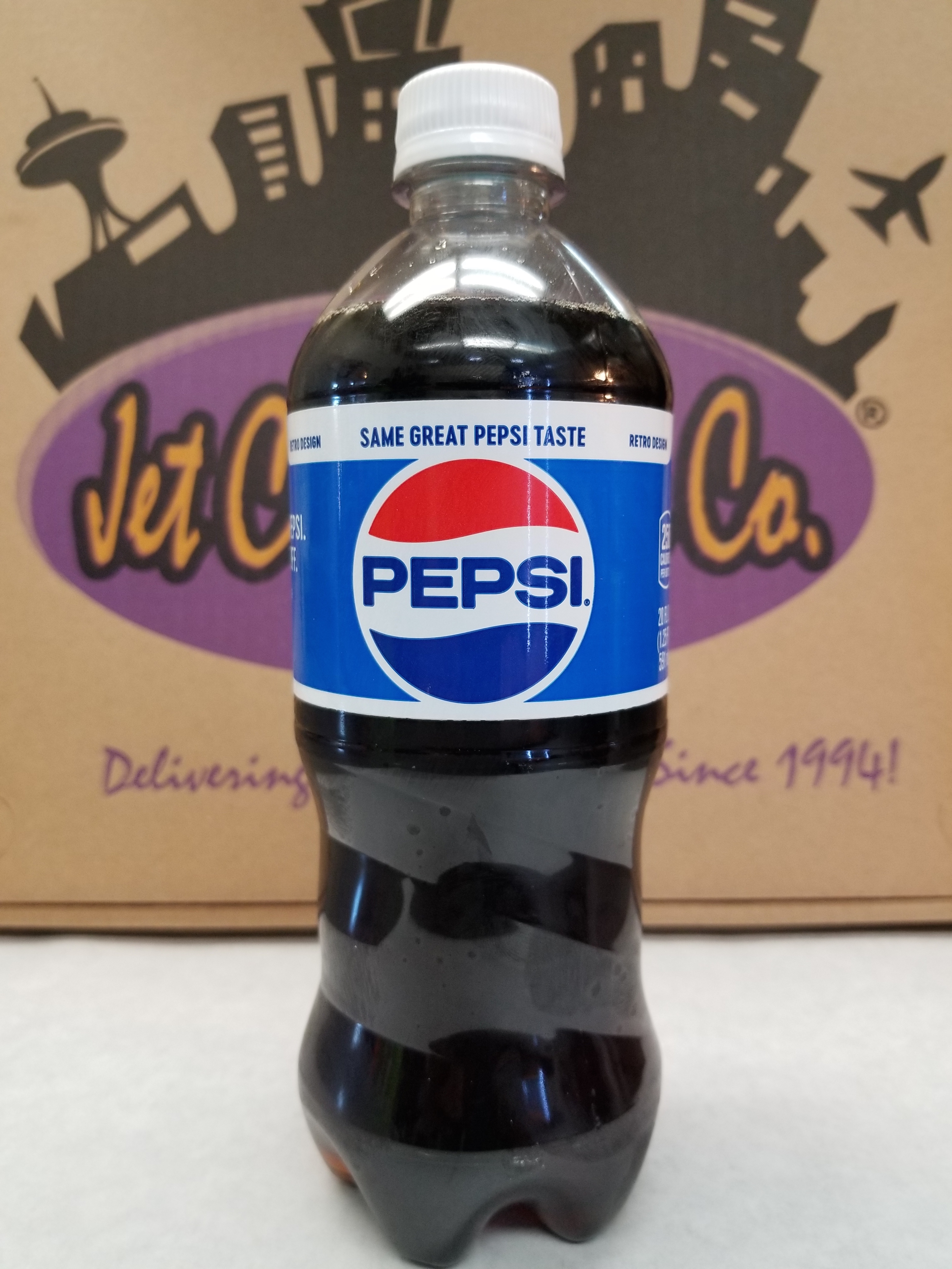 Order 20 oz Pepsi Bottled Soda food online from Jet City Pizza Co. store, Seattle on bringmethat.com