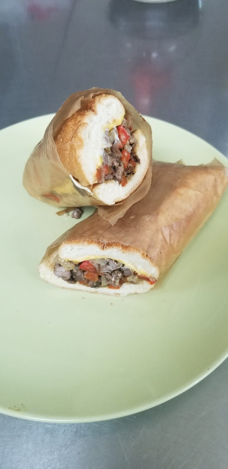 Order Philly Cheese Steak Sandwich food online from Aminas Cafe store, Bronx on bringmethat.com