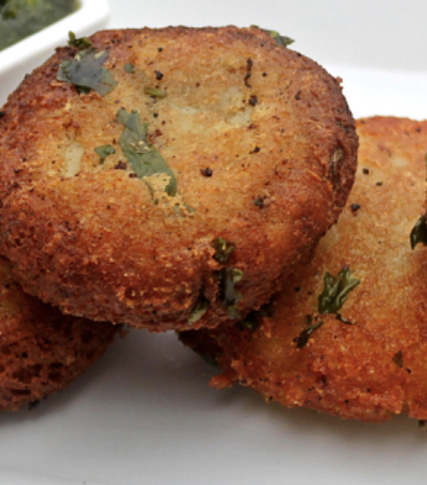 Order Vegetable Tikki 2 pieces food online from Cuisine of India store, Naperville on bringmethat.com