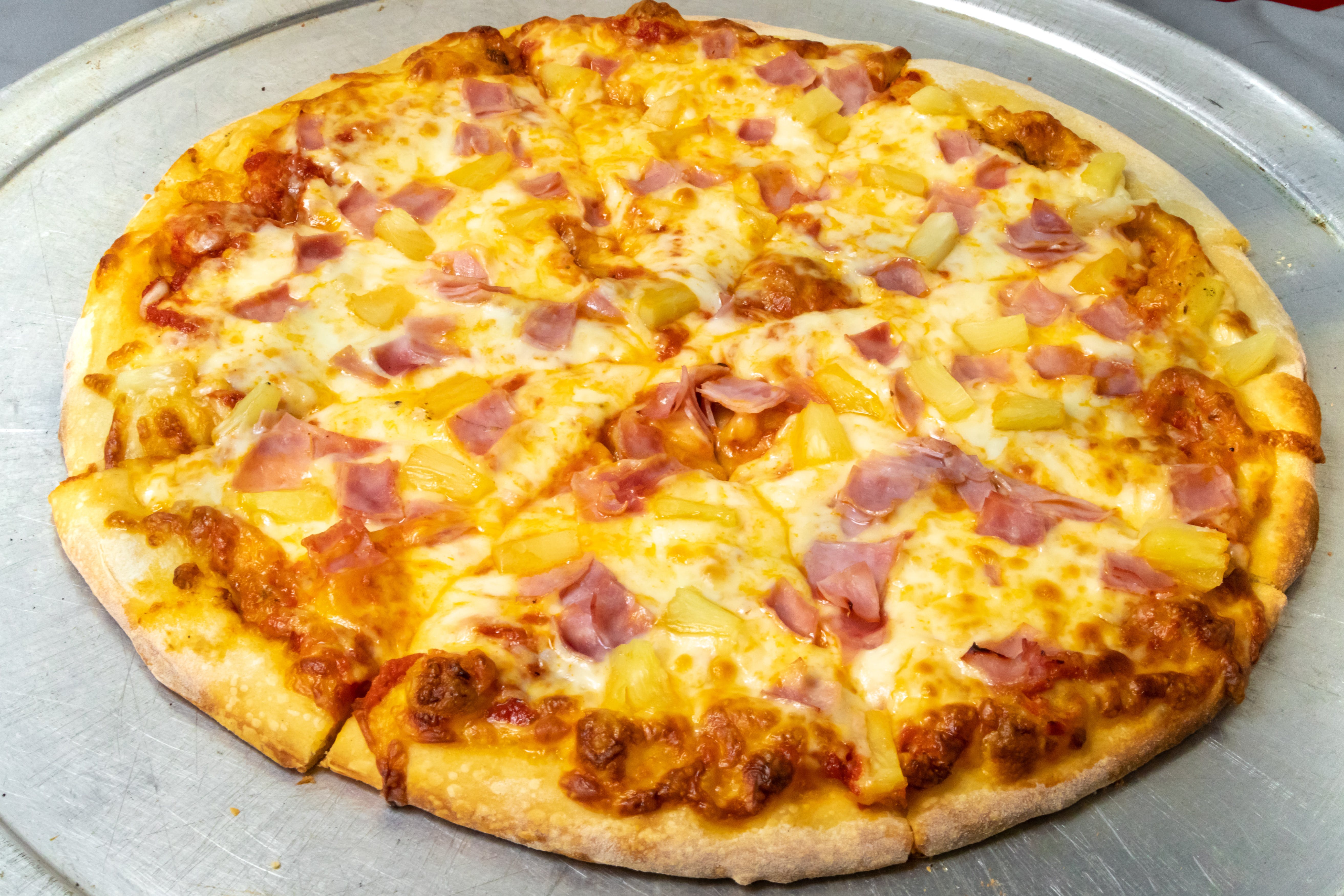 Order Hawaiian Pizza - Small 10" (4 Cut) food online from Novotny's Groceries & Pizza store, Worthington on bringmethat.com