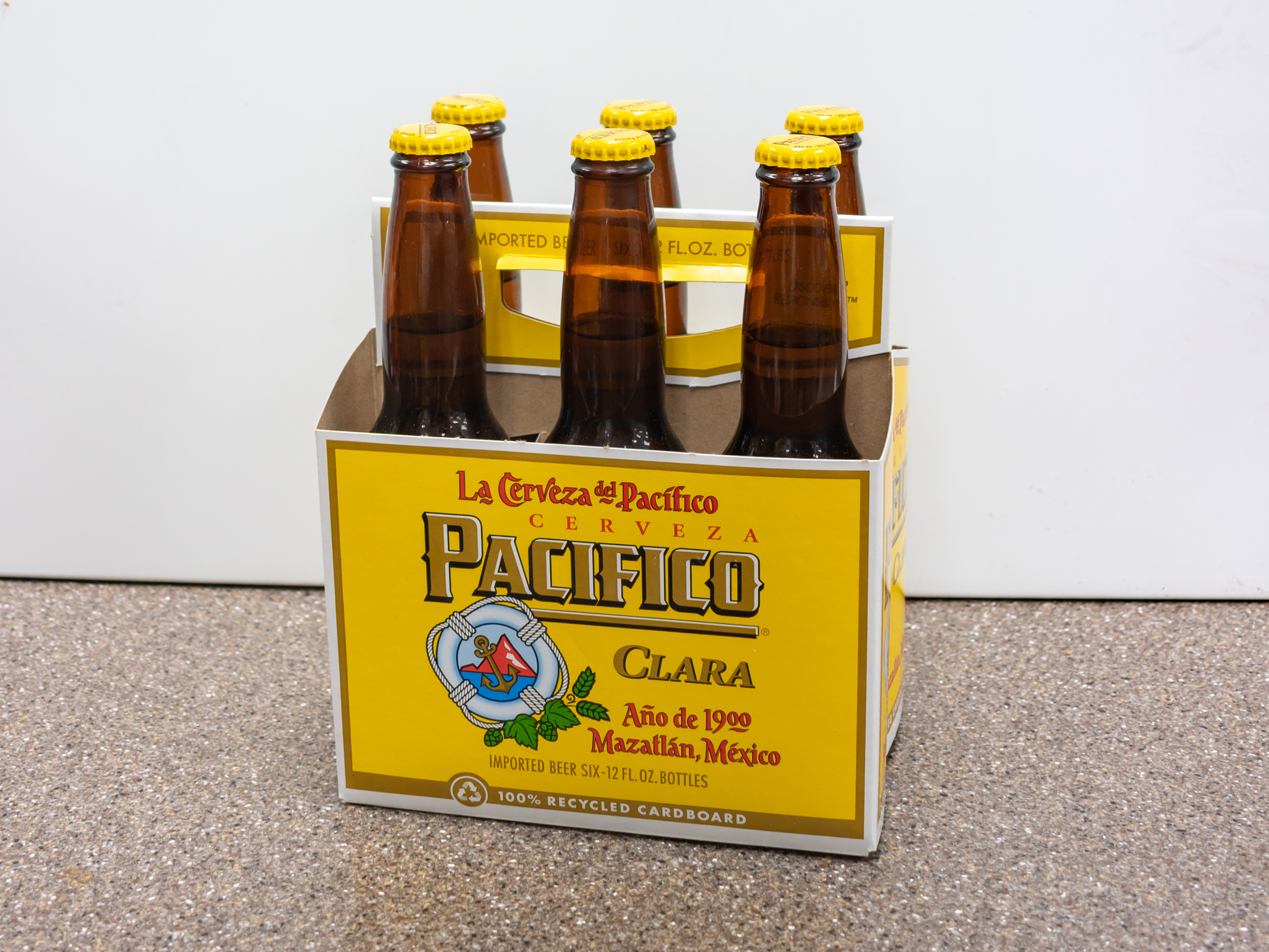 Order Bottled Pacifico Clara Mexican Lager Beer, 12 oz. food online from Kangaroo Food Mart store, Cathedral City on bringmethat.com