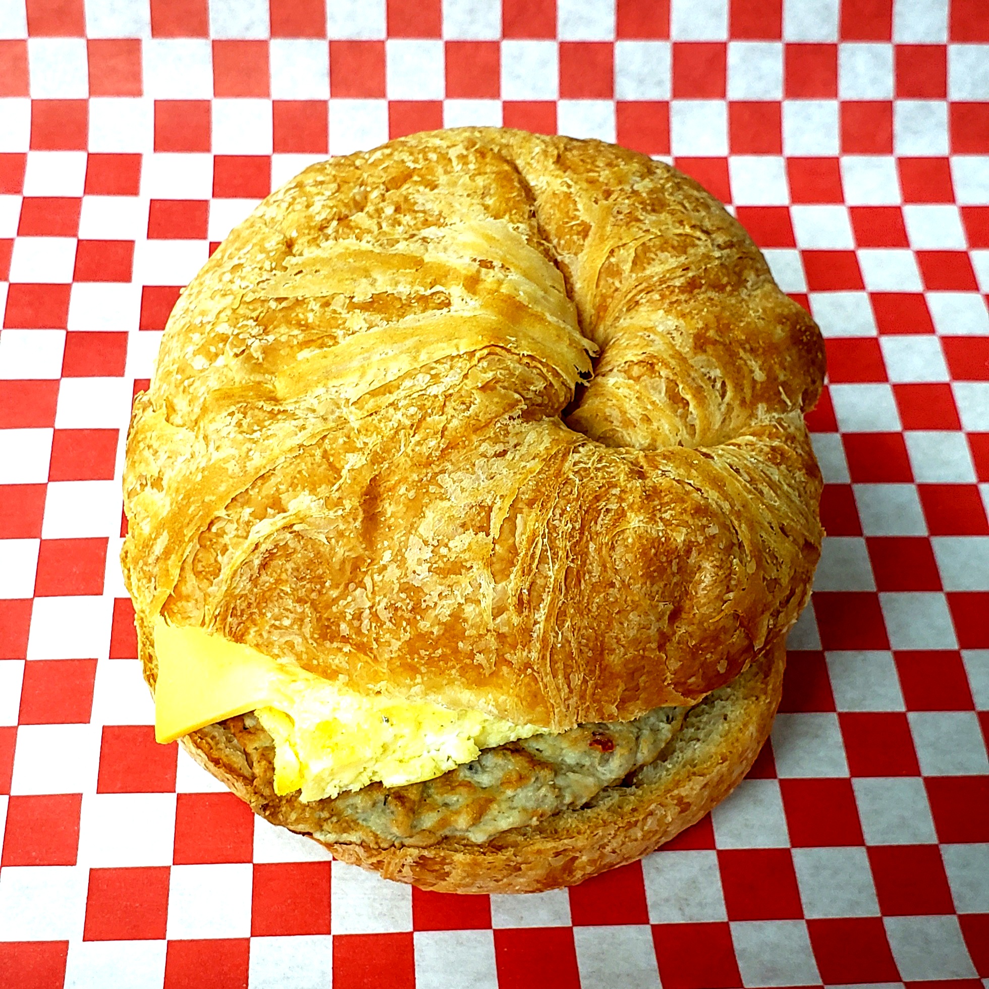 Order Sausage Croissant Sandwich food online from Mydonuts store, Dallas on bringmethat.com