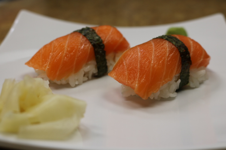 Order 2 Pieces Salmon Sake Sushi Nigiri food online from Misora Teriyaki Sushi & Wok store, Lynnwood on bringmethat.com