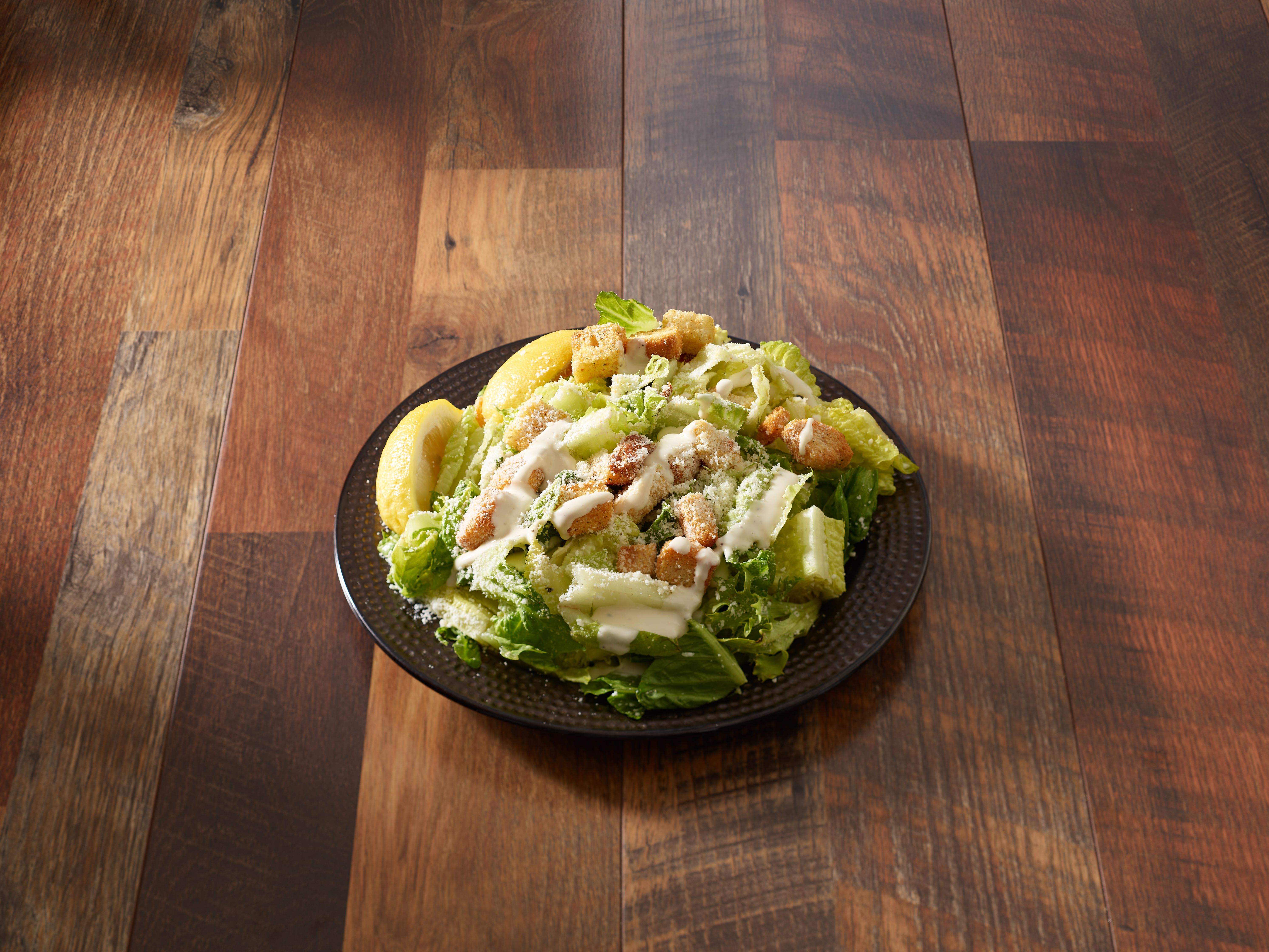 Order Caesar Salad food online from Sorrento's Brick Oven Pizza store, Hamden on bringmethat.com