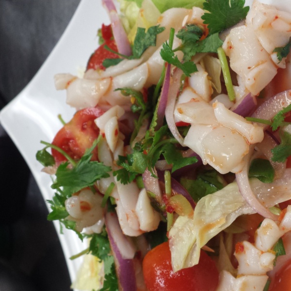 Order 35. Calamari Salad food online from Jasmine Thai Noodle & BBQ store, Valencia on bringmethat.com