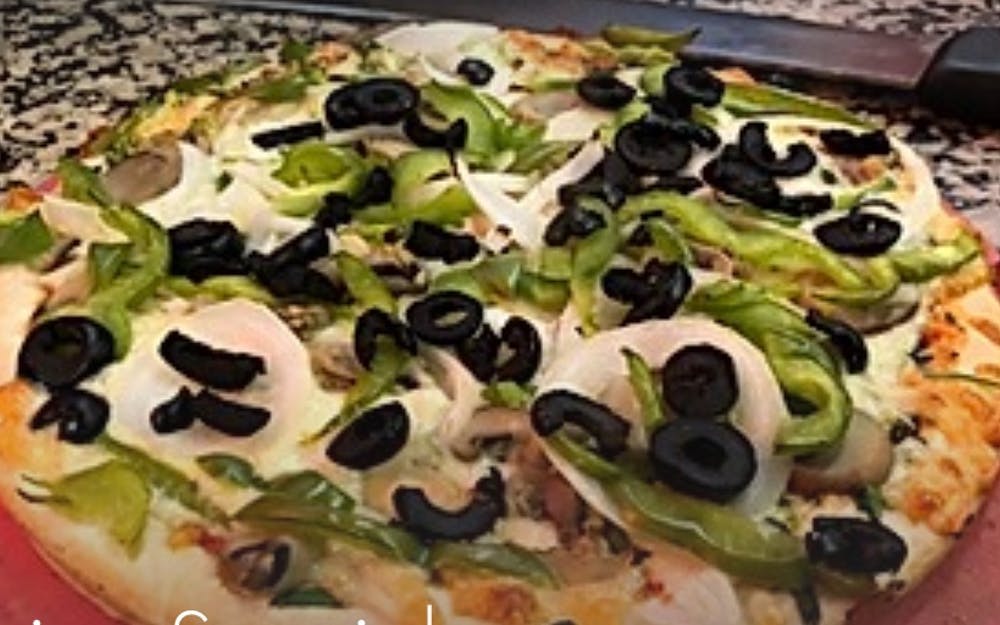 Order Vegetarian Pizza - 10'' (Serves 2) food online from Singas famous pizza store, Kew Gardens on bringmethat.com