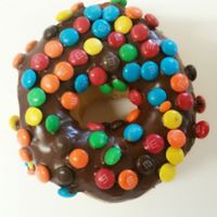 Order Sprinkle Holes Donut food online from Donut Palace store, Denison on bringmethat.com
