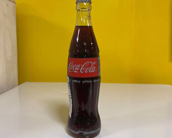 Order Mexican Coca Cola food online from Papaya Fresh Deli store, Paterson on bringmethat.com