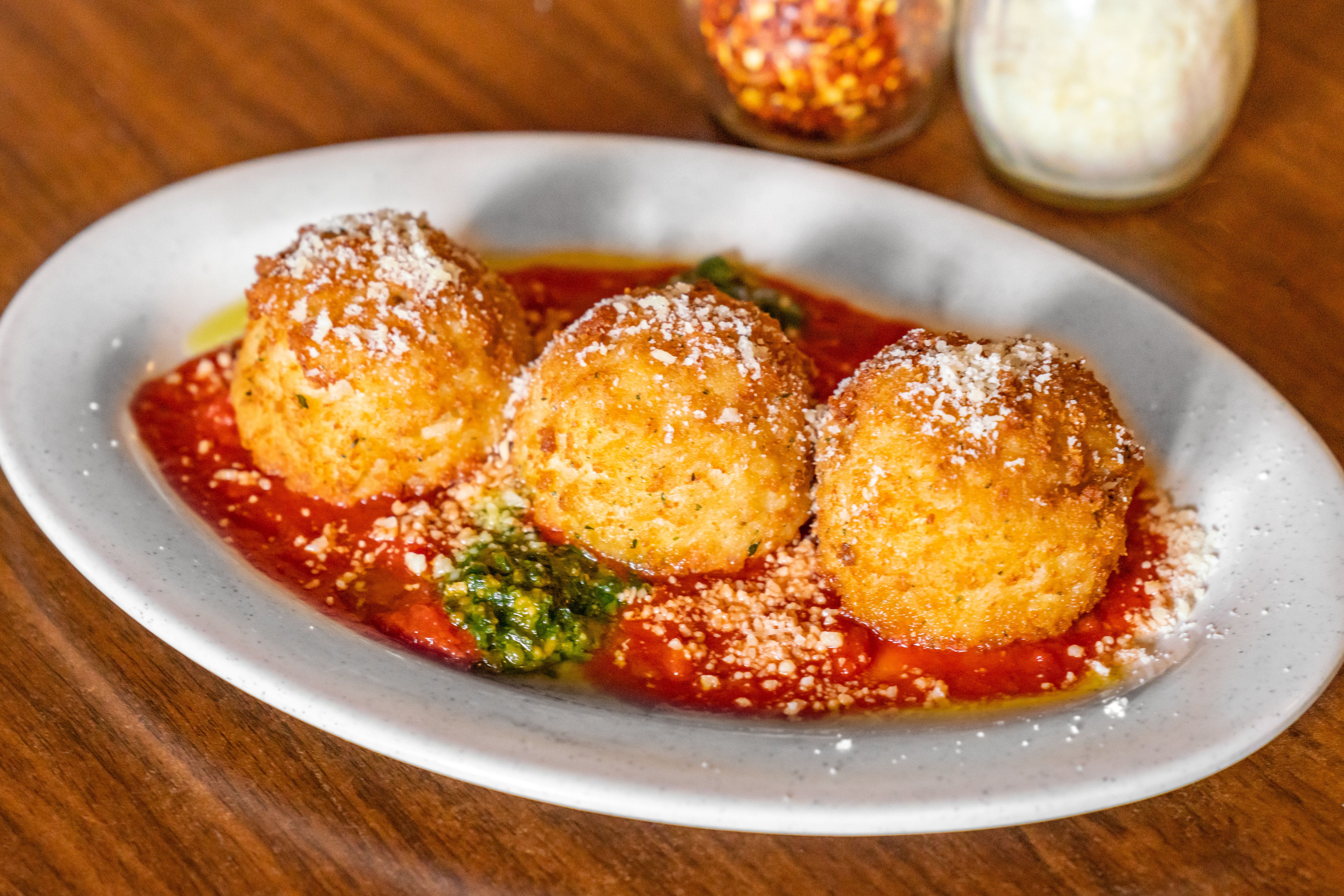 Order House Made Arancini Balls - Appetizer food online from Sainato's at Rivergate store, Cleveland on bringmethat.com