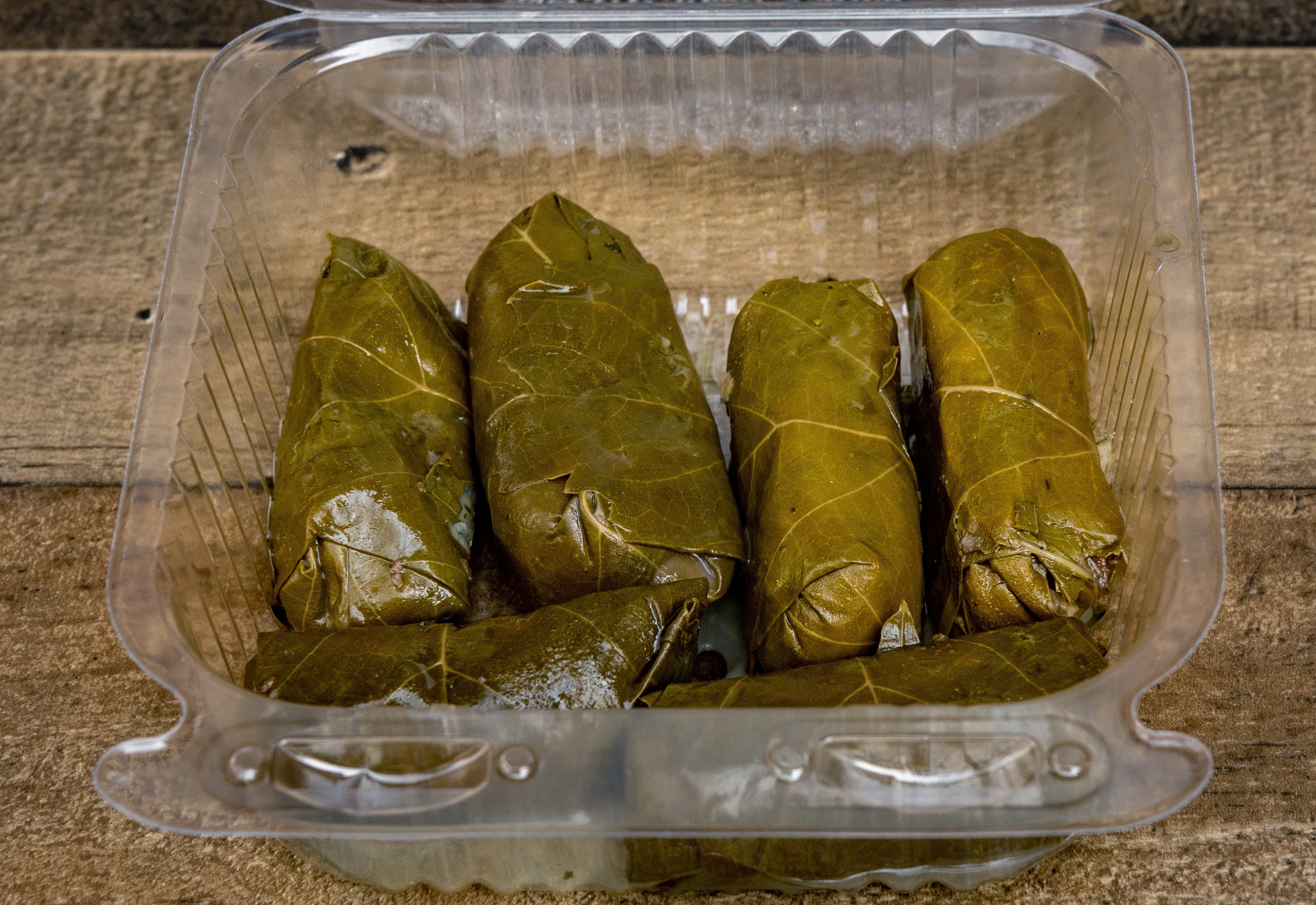 Order Grape Leaves - Side food online from San Remo Pizzeria store, San Diego on bringmethat.com