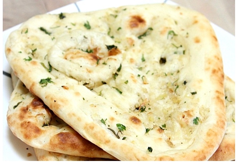 Order Chili Cheese Naan food online from Star India store, San Francisco on bringmethat.com