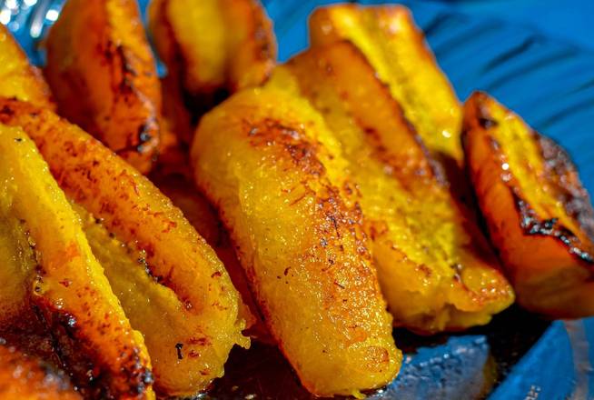 Order Fried Plantain food online from Island Tingz Caribbean Grill store, Humble, Houston on bringmethat.com