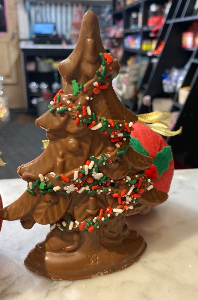 Order MILK Chocolate Solid Christmas Tree food online from The Sweet Shop Nyc store, New York on bringmethat.com