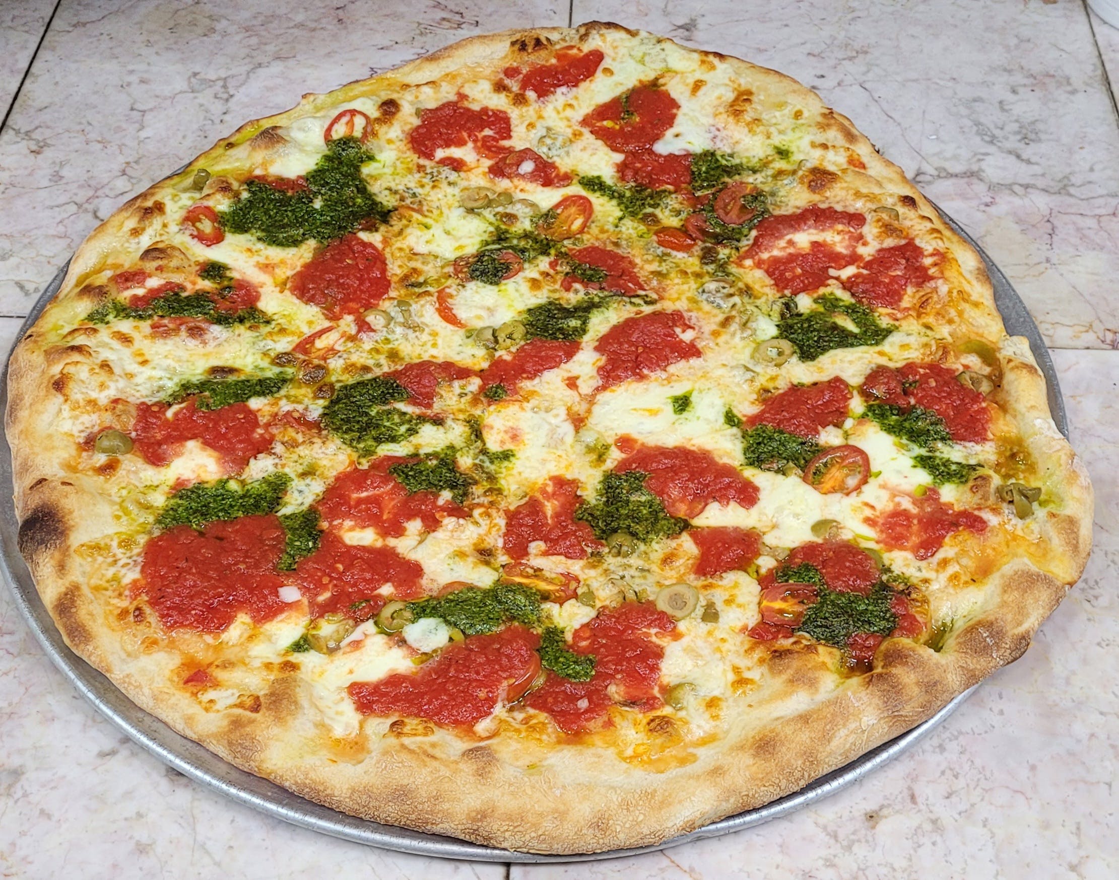 Order Margarita Pesto Pizza - Small food online from Rhythm And Spice Pizzeria And Grill store, New Brunswick on bringmethat.com