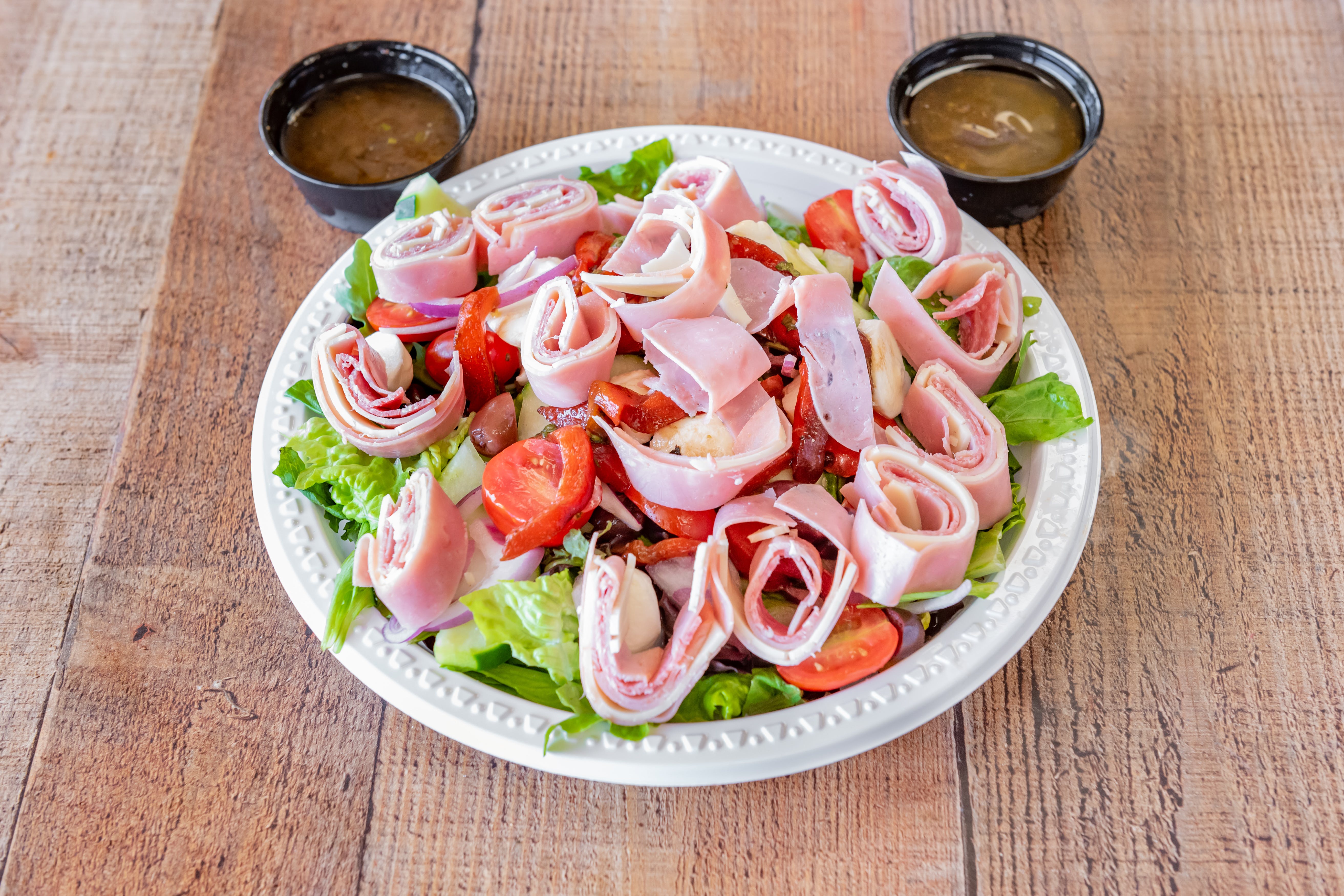 Order Antipasto Salad - Salad food online from Tonys Pizzeria & Italian Restaurant store, Audubon on bringmethat.com