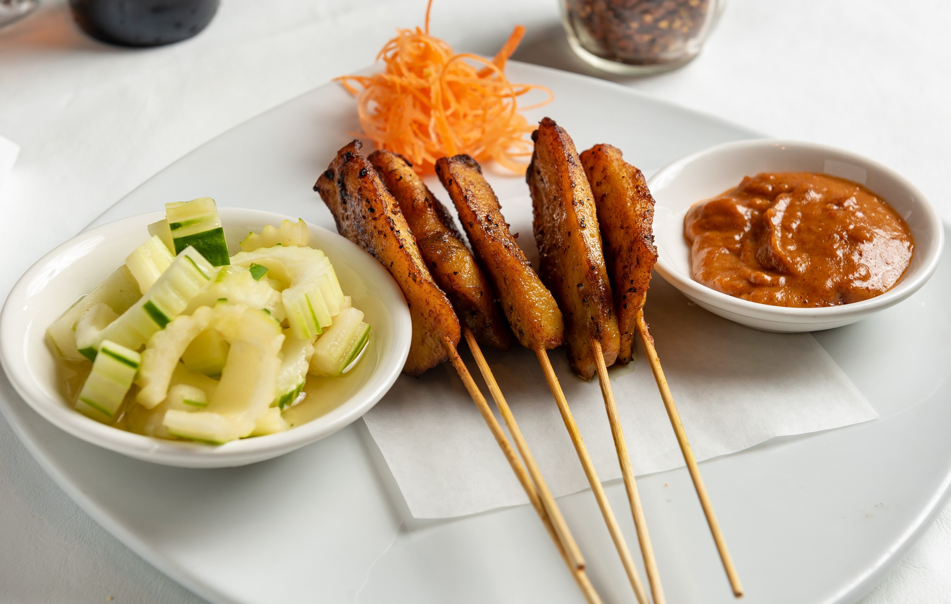 Order Satay Chicken Appetizer food online from Phuket Thai Restaurant store, Huntsville on bringmethat.com