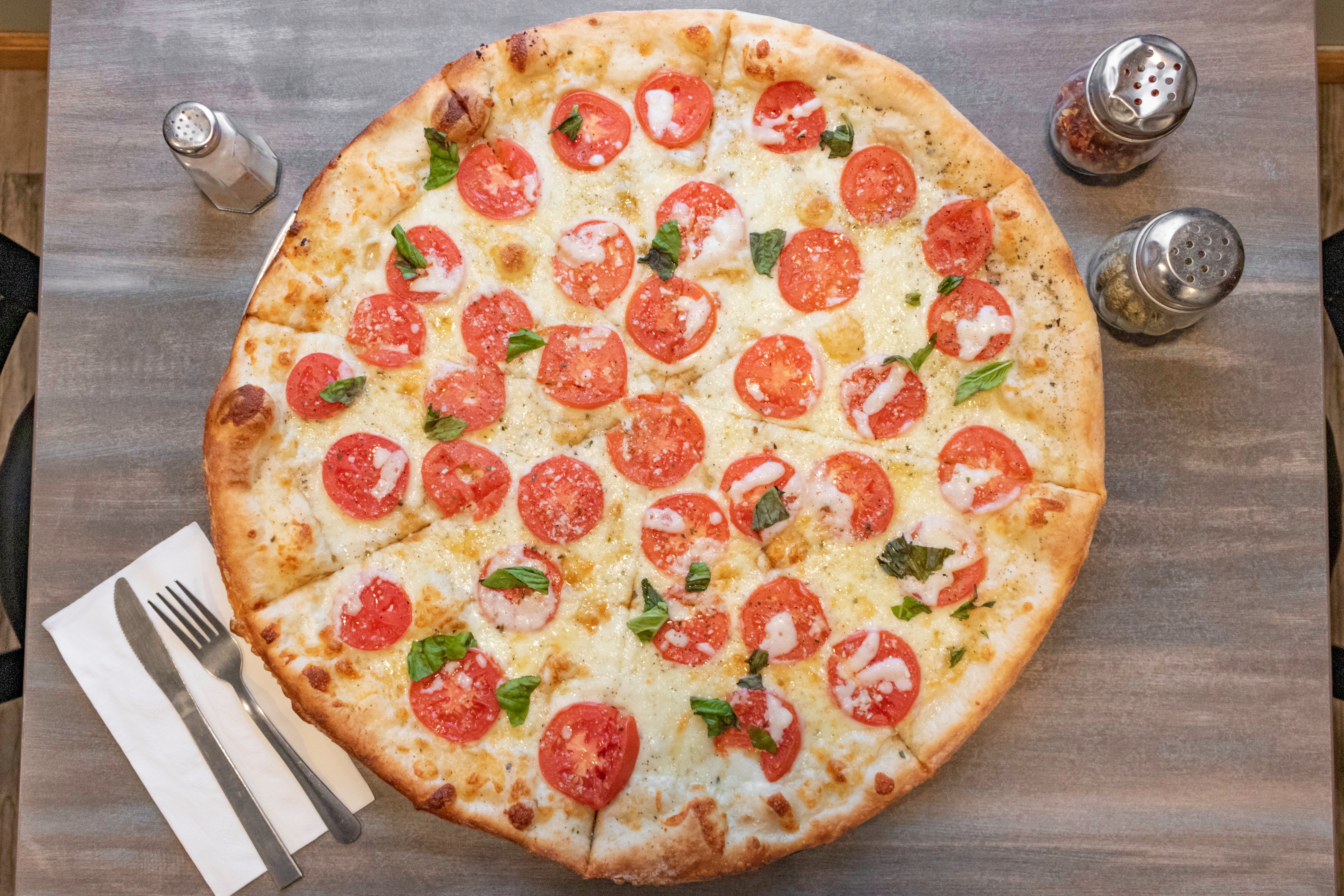 Order White Pizza with Tomato - Medium 14'' food online from Vincenzo's Pizza store, Bensalem on bringmethat.com