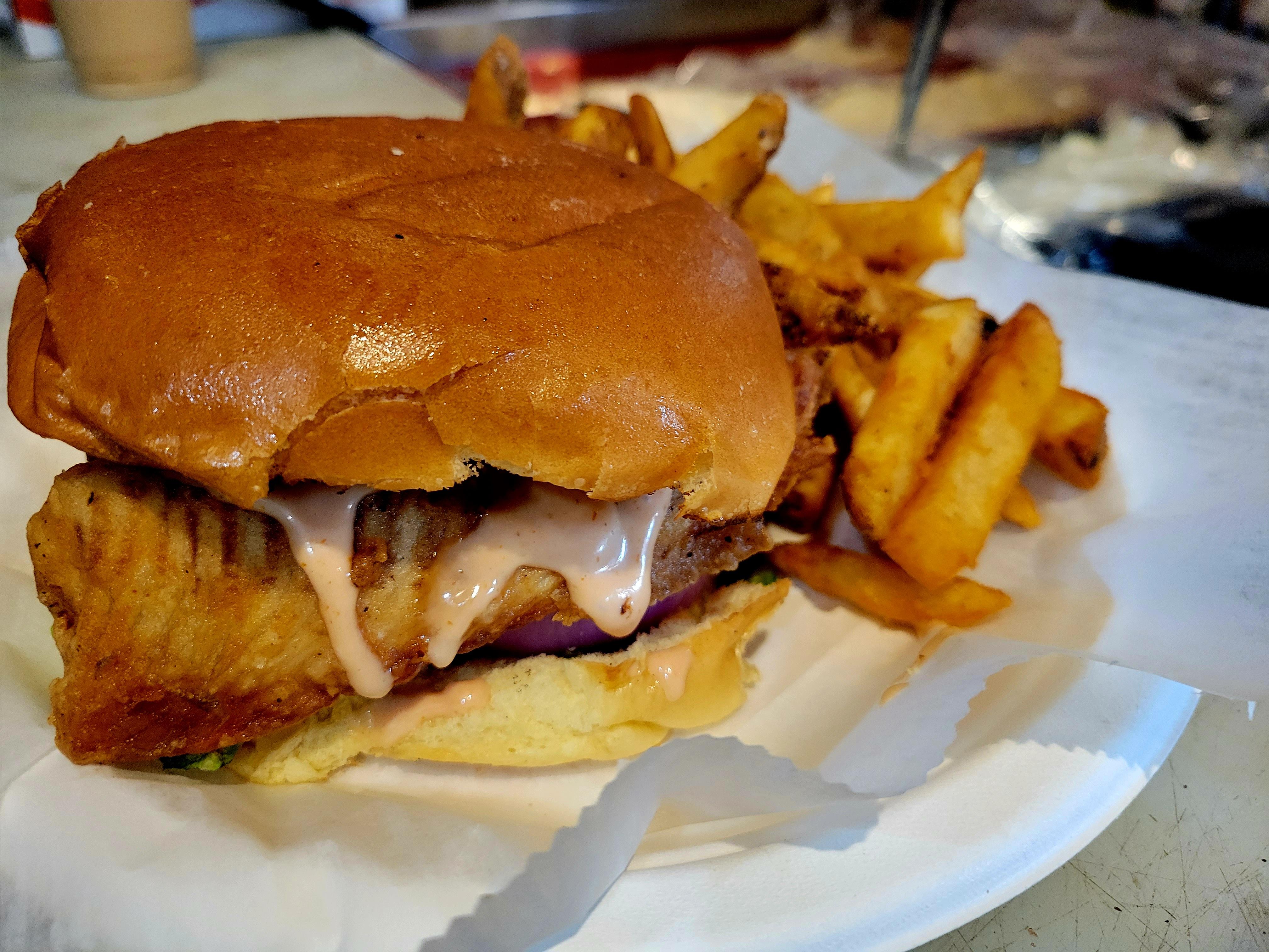 Order Crispy Fish Burger food online from Manakeesh Cafe Bakery store, Philadelphia on bringmethat.com