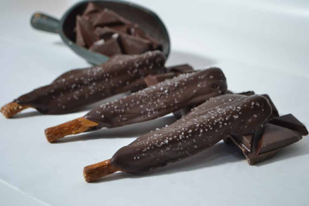 Order Caramel, Dark Chocolate & Sea Salt Pretzel Rod food online from Candy Apple Shoppe store, Glenwood on bringmethat.com