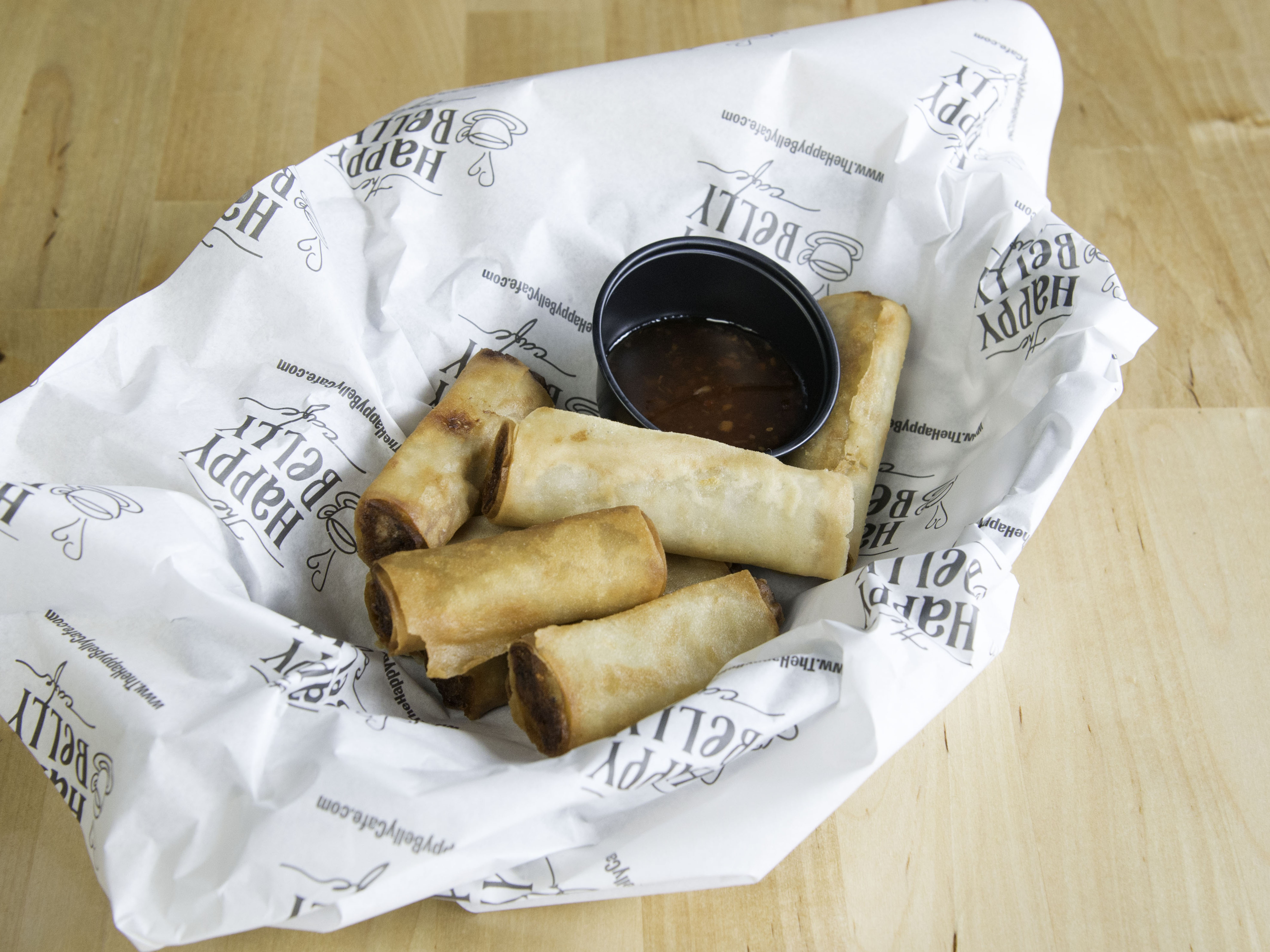 Order Crispy Fried Spring Rolls food online from The Happy Belly Cafe store, Clifton on bringmethat.com