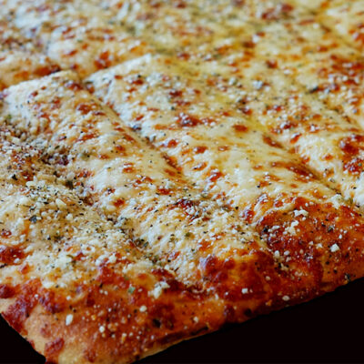 Order Small Cheesy Bread Stix food online from Francos Pizza & More store, Kenmore on bringmethat.com