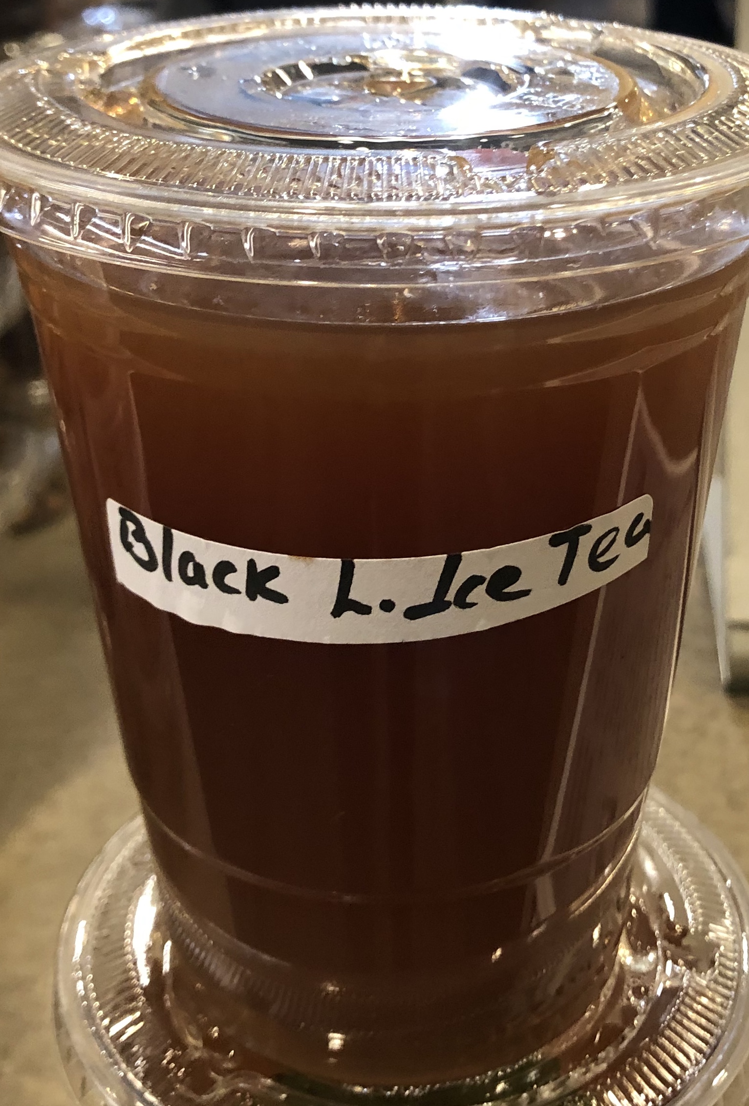 Order Hand-Made Black Iced Tea with Lemon food online from Falafel Taco store, Pleasantville on bringmethat.com