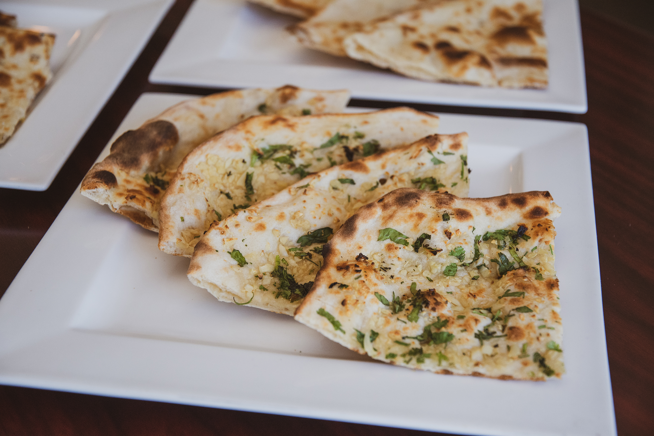 Order Garlic Naan food online from Spice Delight store, Belmont on bringmethat.com