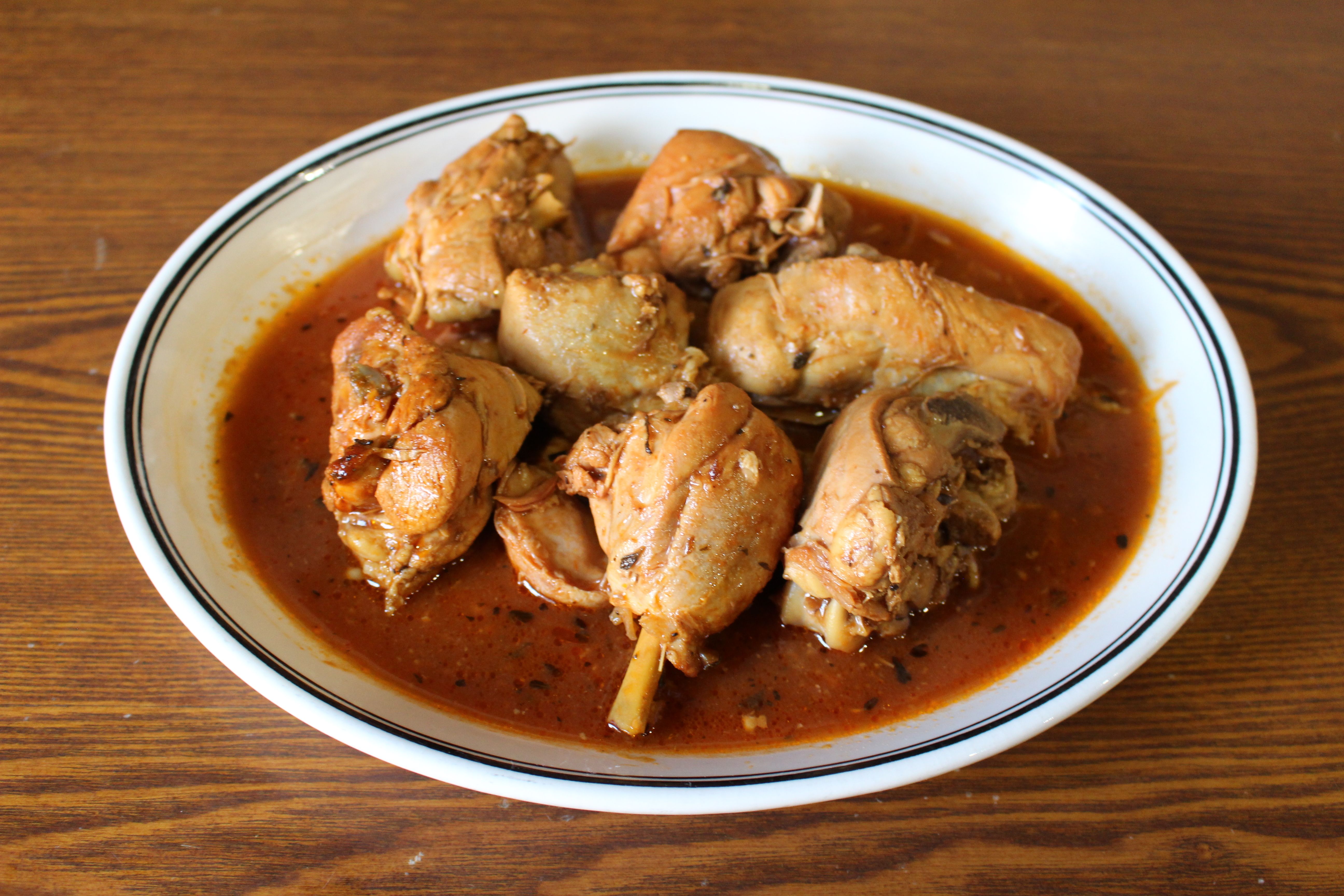 Order Pollo Guisado food online from Sandy store, New York on bringmethat.com
