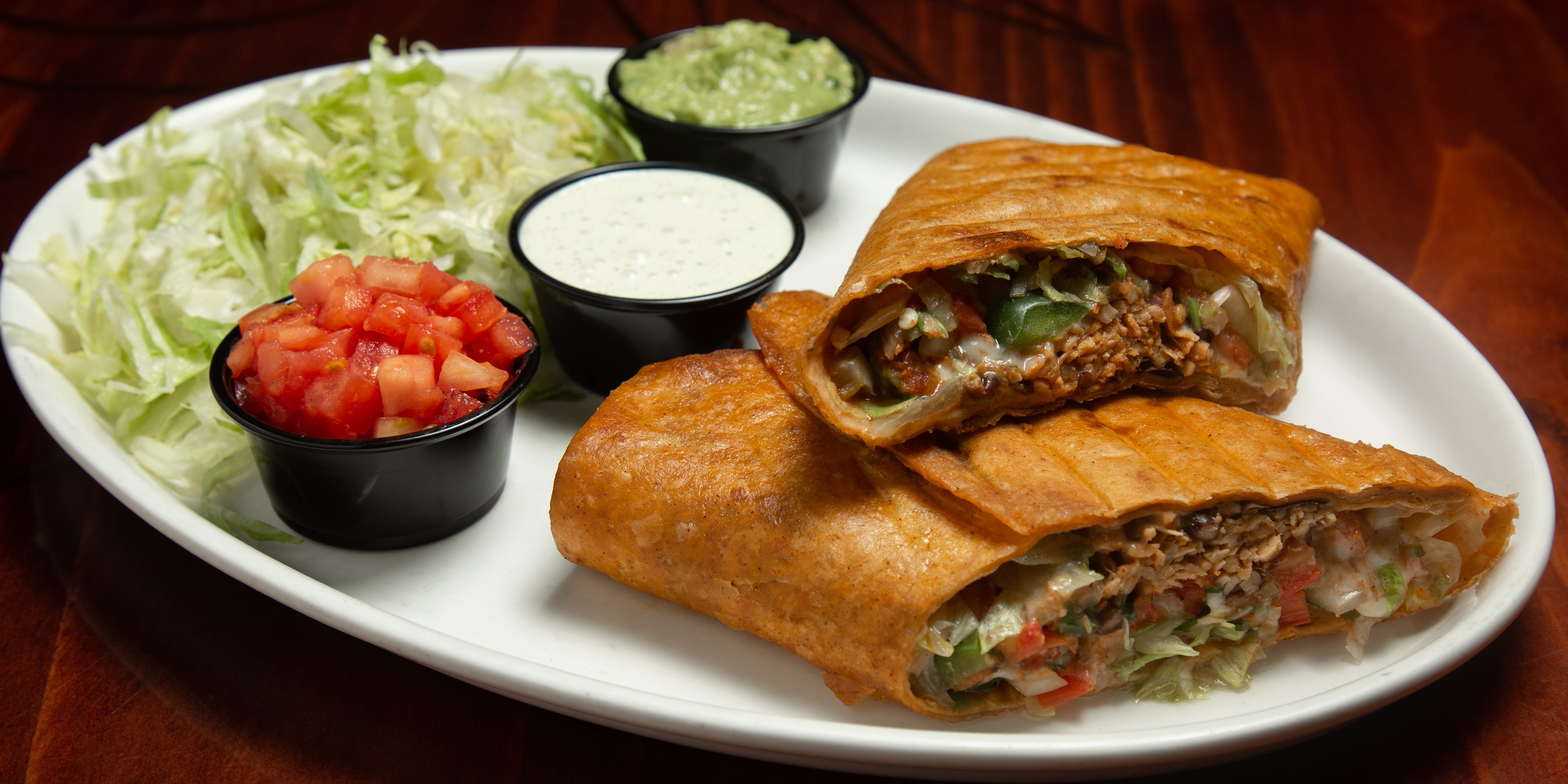 Order Texas Chimichanga food online from Tito Mexican Restaurant store, Spring Hill on bringmethat.com