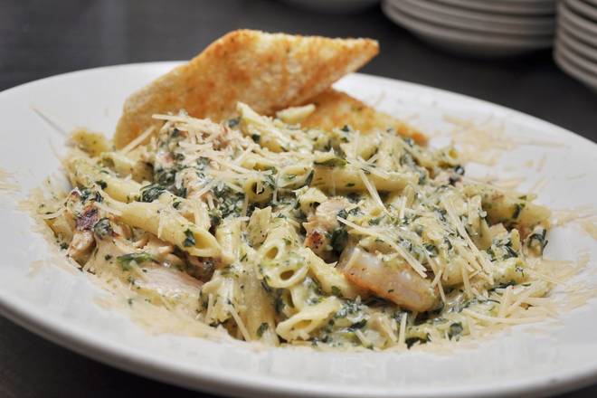 Order SPINACH & ARTICHOKE CREAM PASTA food online from 54th Street Grill and Bar store, Chesterfield on bringmethat.com