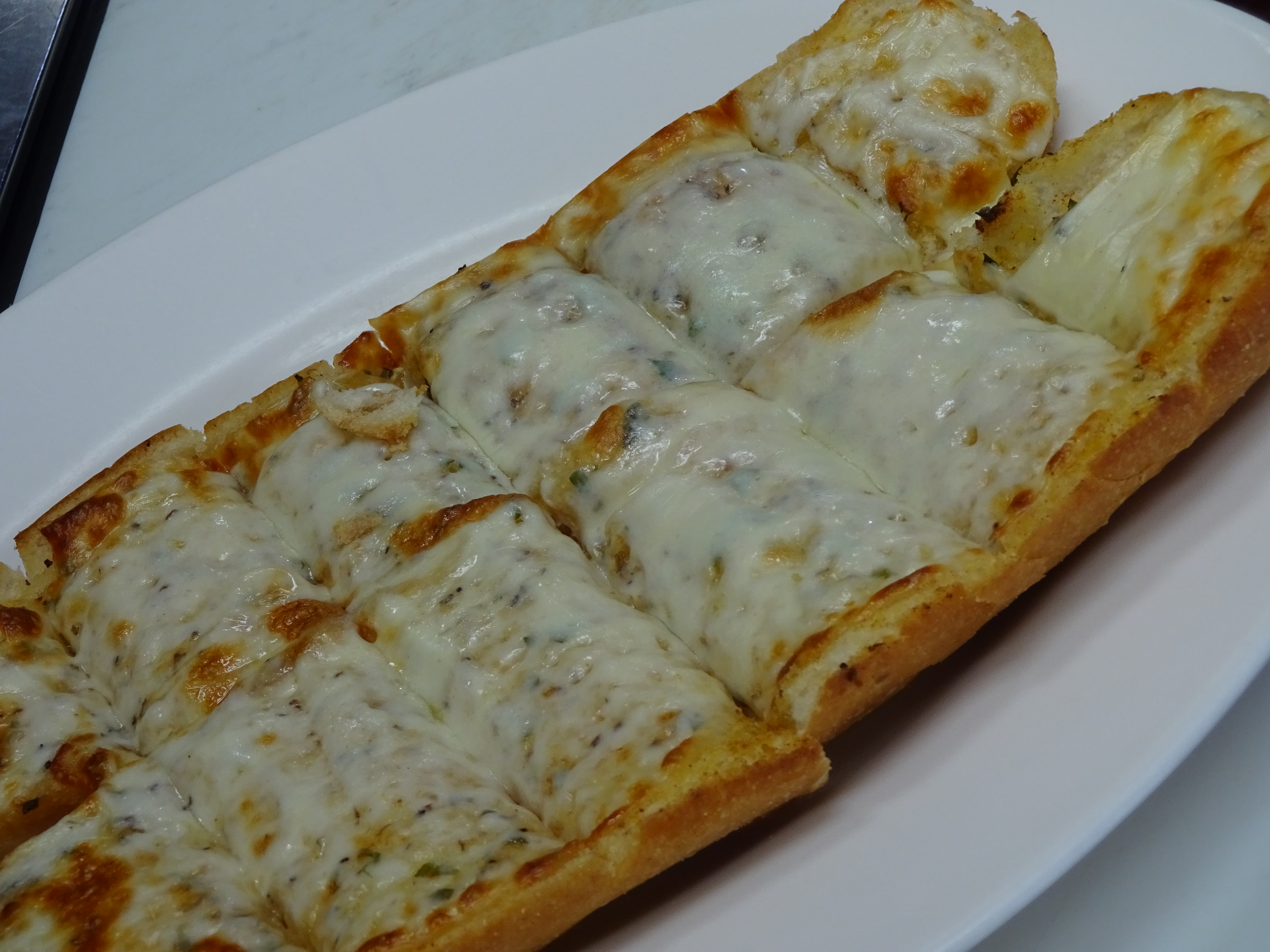 Order Garlic Bread with Cheese food online from Leone Trattoria store, North Brunswick on bringmethat.com