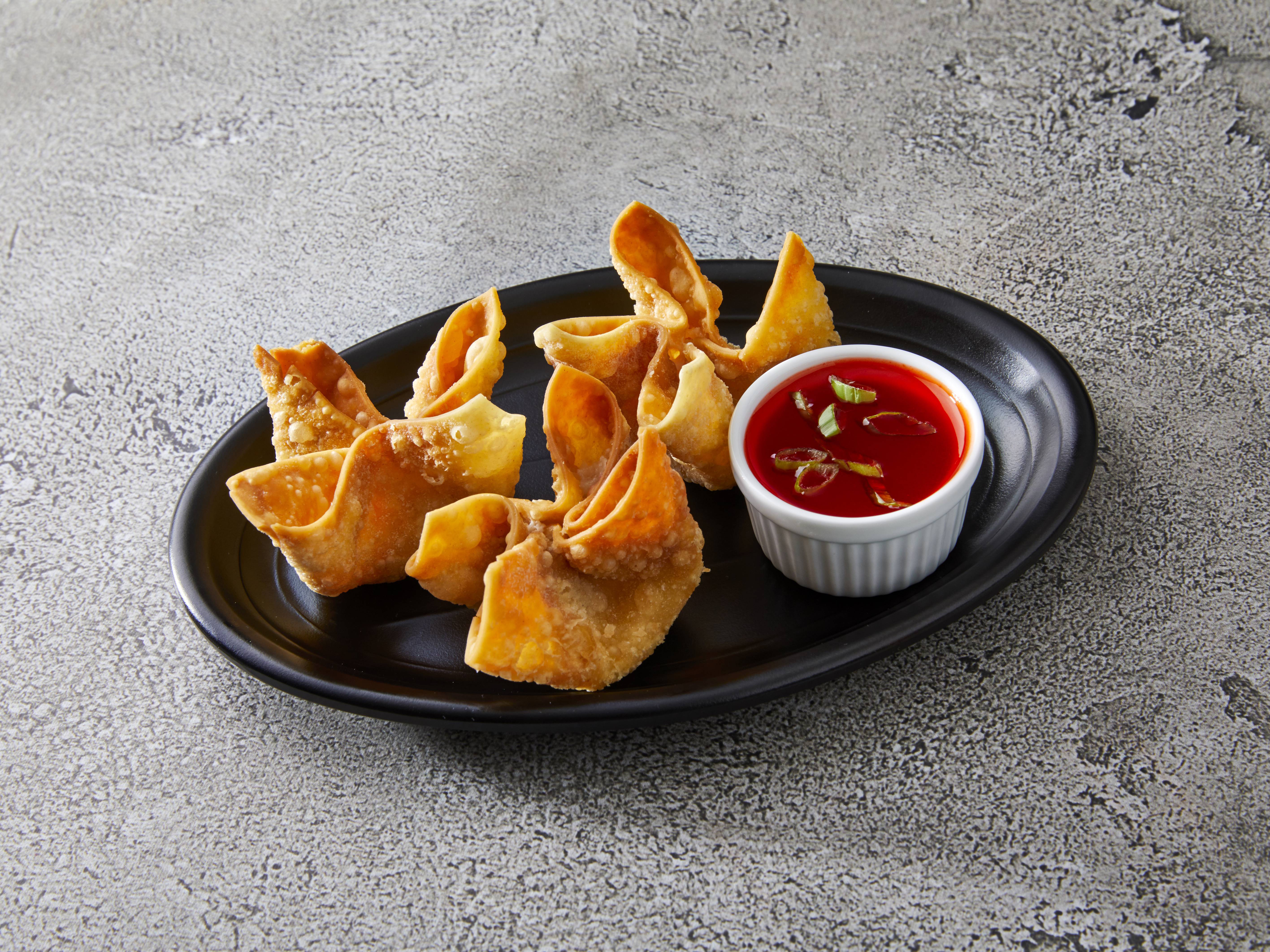 Order 4 Fried Crabmeat Rangoons food online from Ming Garden store, Champaign on bringmethat.com