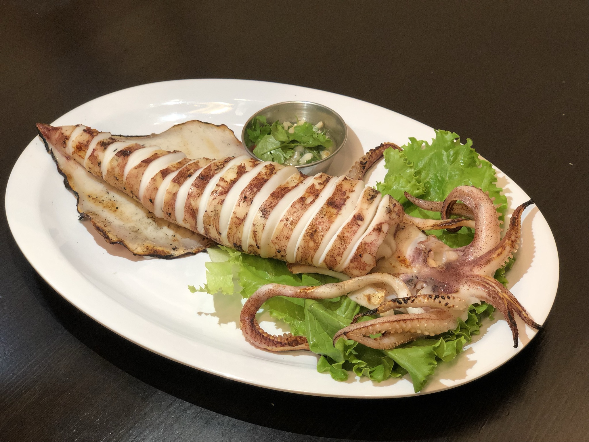 Order Grilled Jumbo Squid food online from Thai Avenue store, Garden Grove on bringmethat.com
