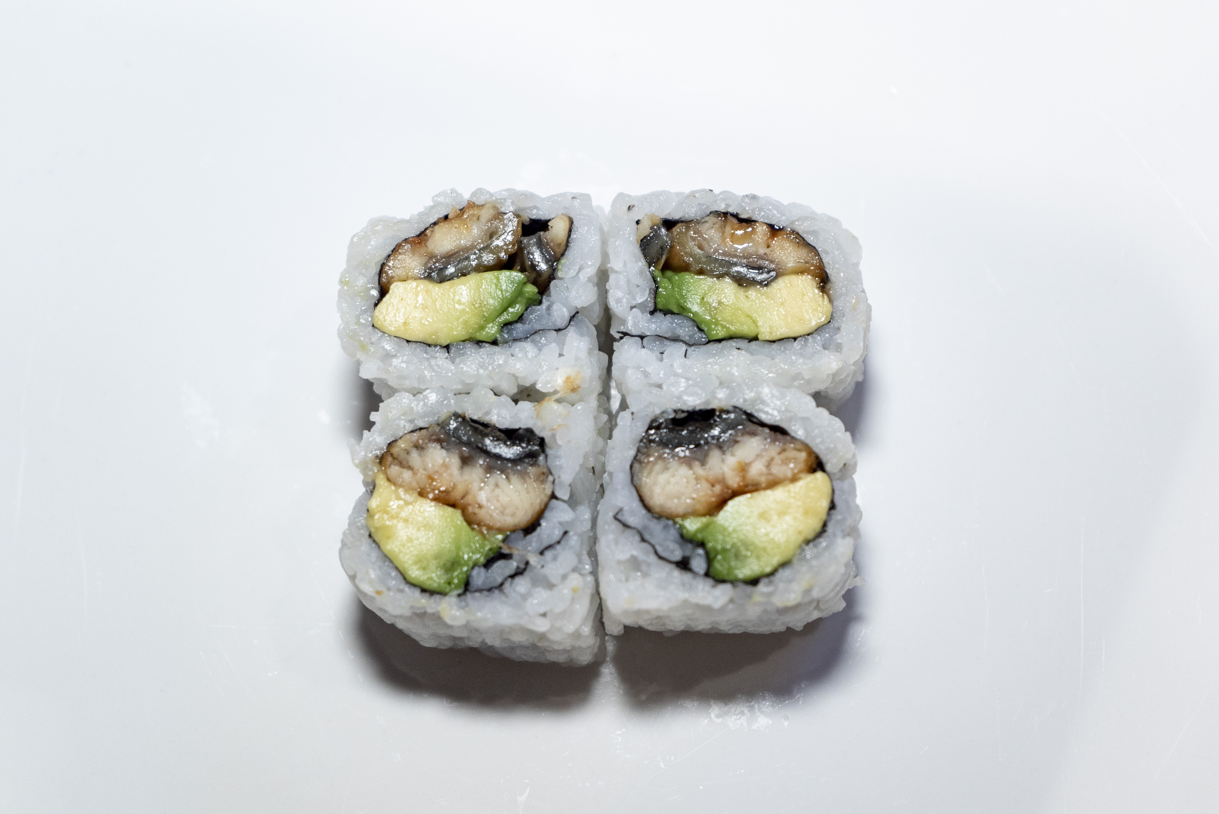 Order Eel Avocado Roll food online from Zutto Japanese American Pub store, New York on bringmethat.com