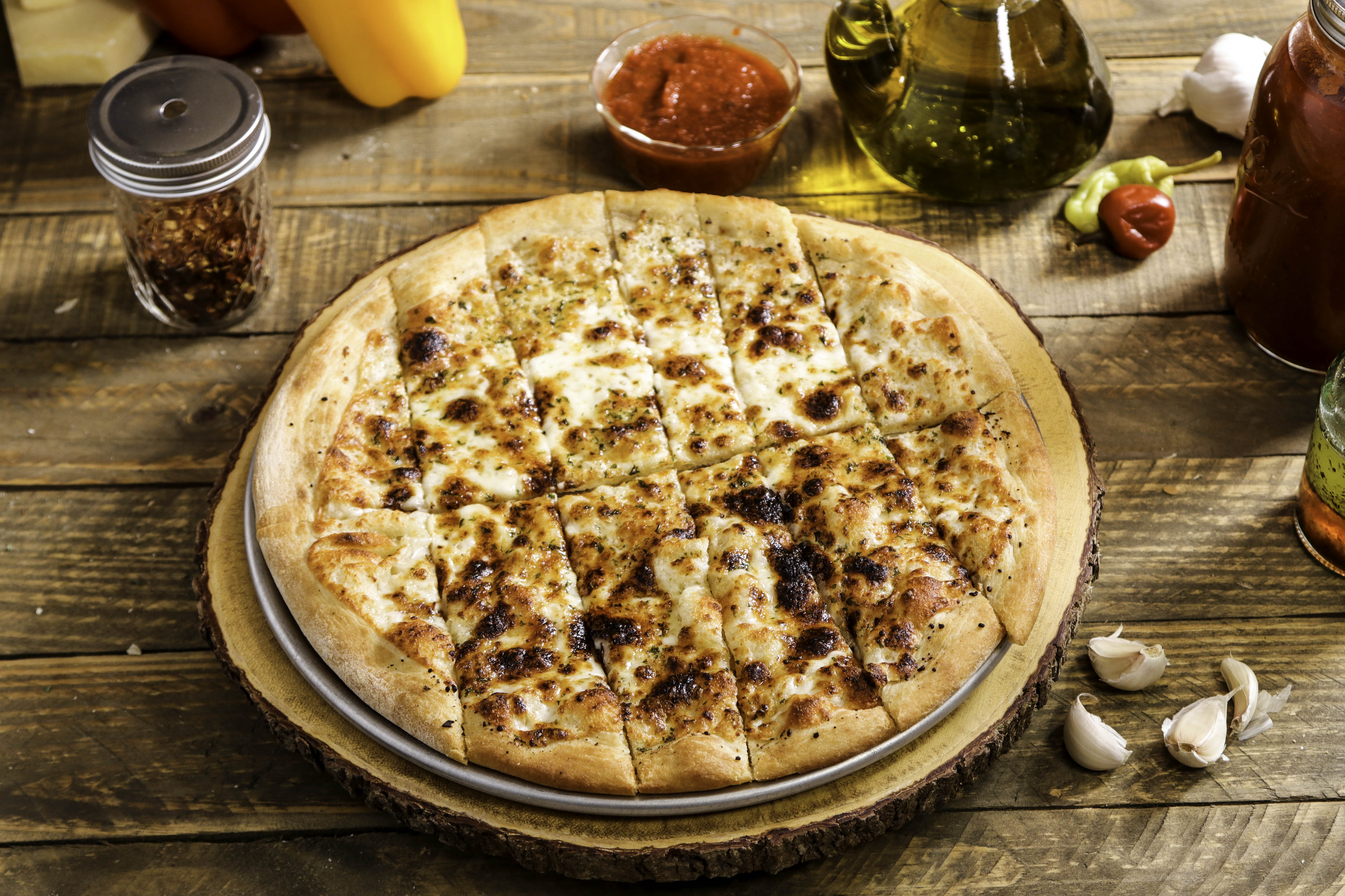 Order Garlic Cheese Sticks  food online from Ameci Pizza & Pasta - Lake Forest store, Lake Forest on bringmethat.com
