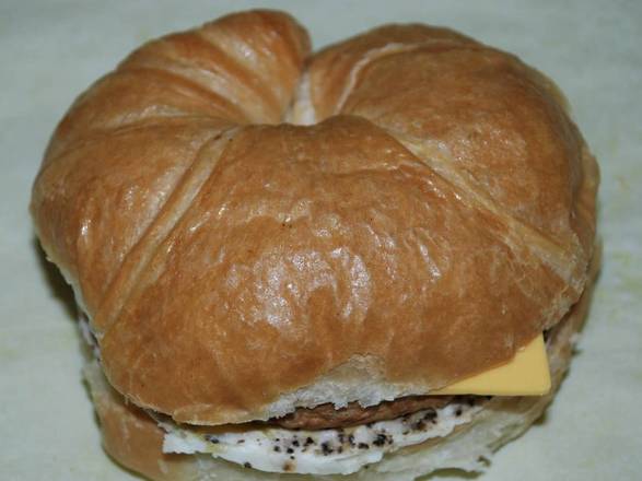 Order Sausage, Egg, and Cheese Croissant food online from Dawn Donuts store, League City on bringmethat.com