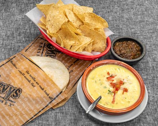 Order Chile con Queso food online from Chevys Fresh Mex store, Minneapolis on bringmethat.com