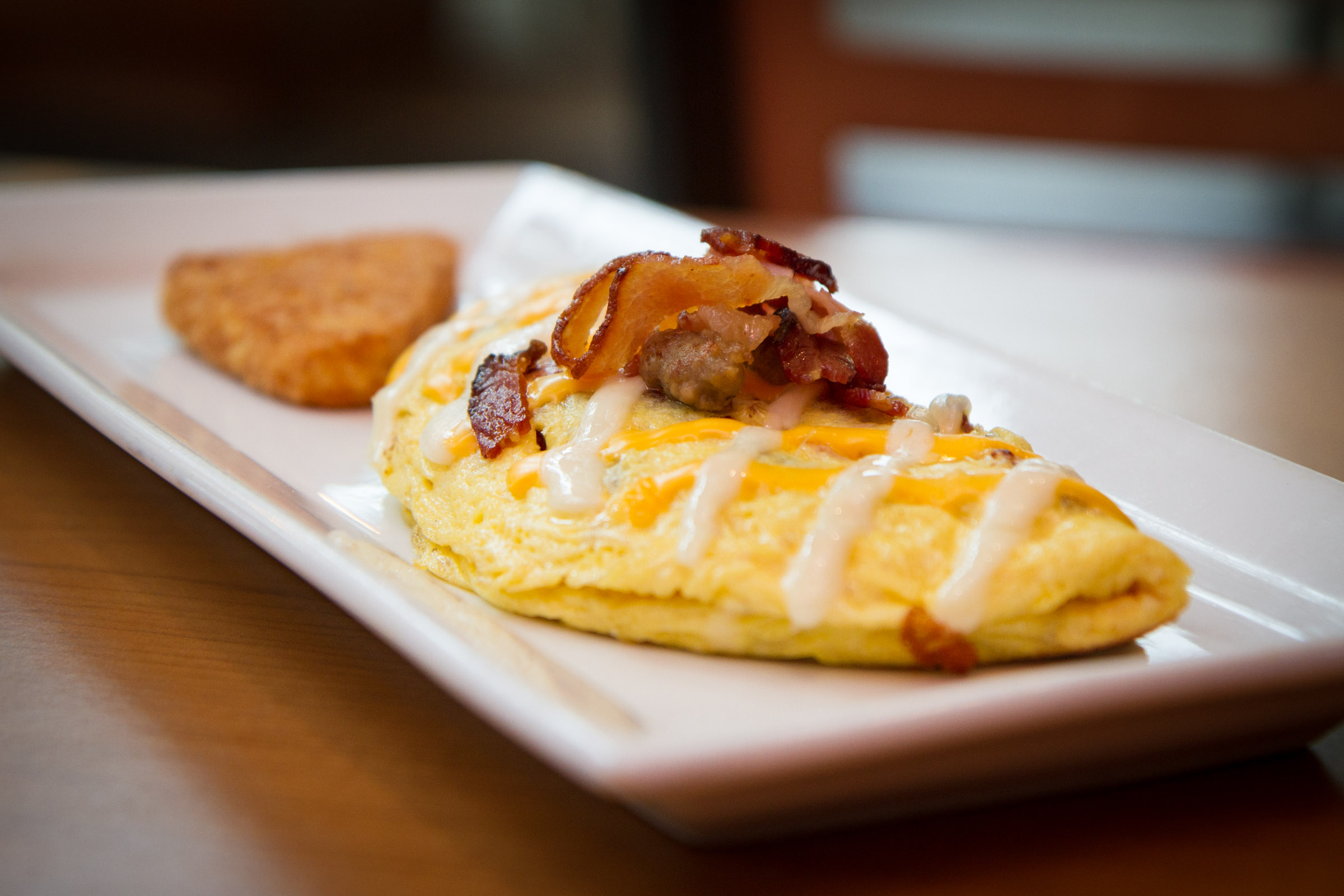 Order Meat Lovers Omelet food online from Espression Cafe store, Las Vegas on bringmethat.com