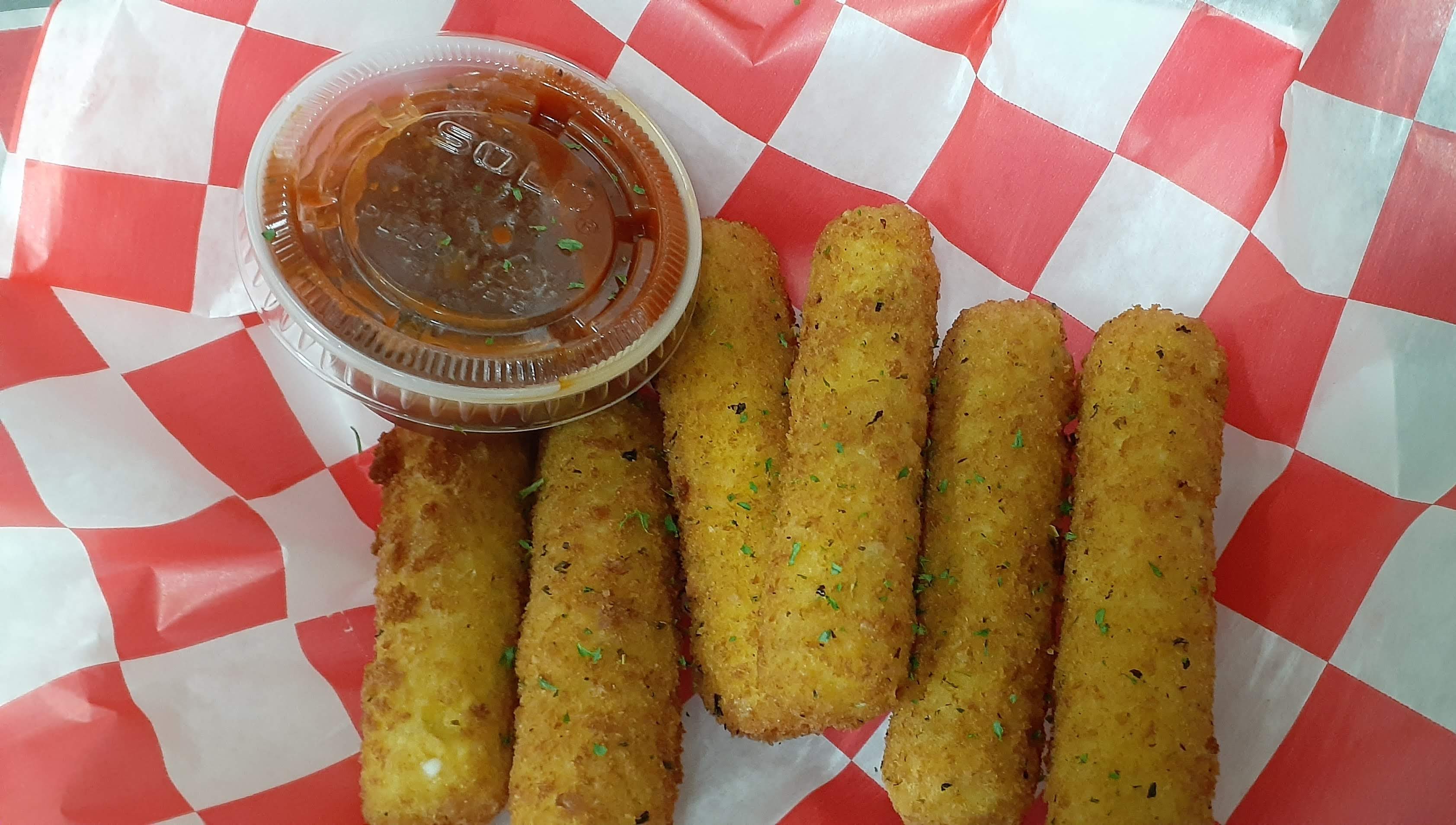 Order 6 Piece Mozzarella Sticks food online from Crunch And Munch Take Out store, Bridgeport on bringmethat.com