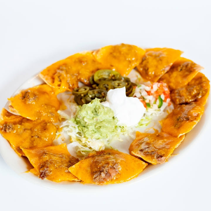 Order Texas-Style Nachos food online from El Fenix Mexican Restaurant store, Greenville on bringmethat.com