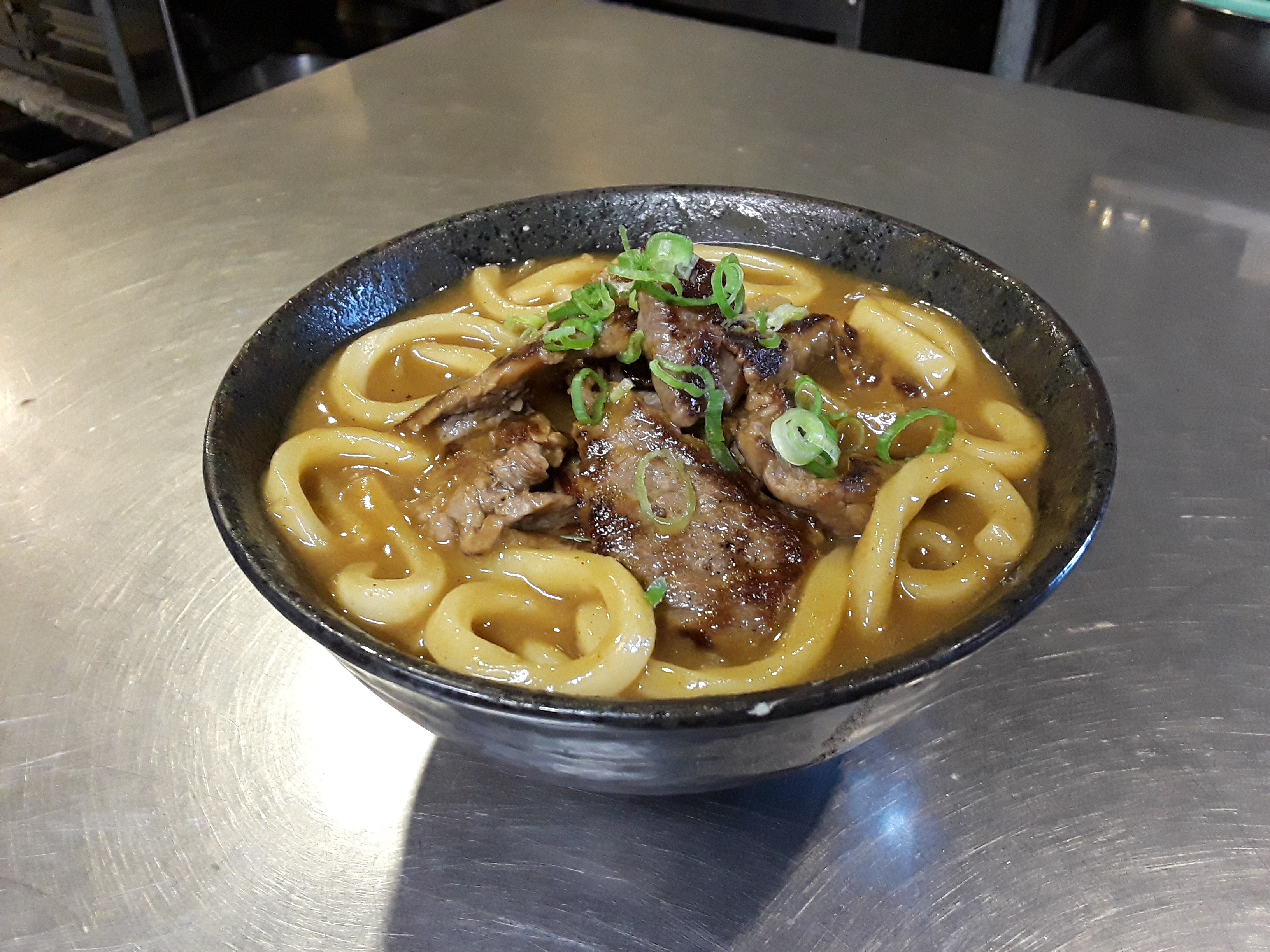 Order Beef Curry Udon  food online from Sushi Dragon store, Sun Valley on bringmethat.com