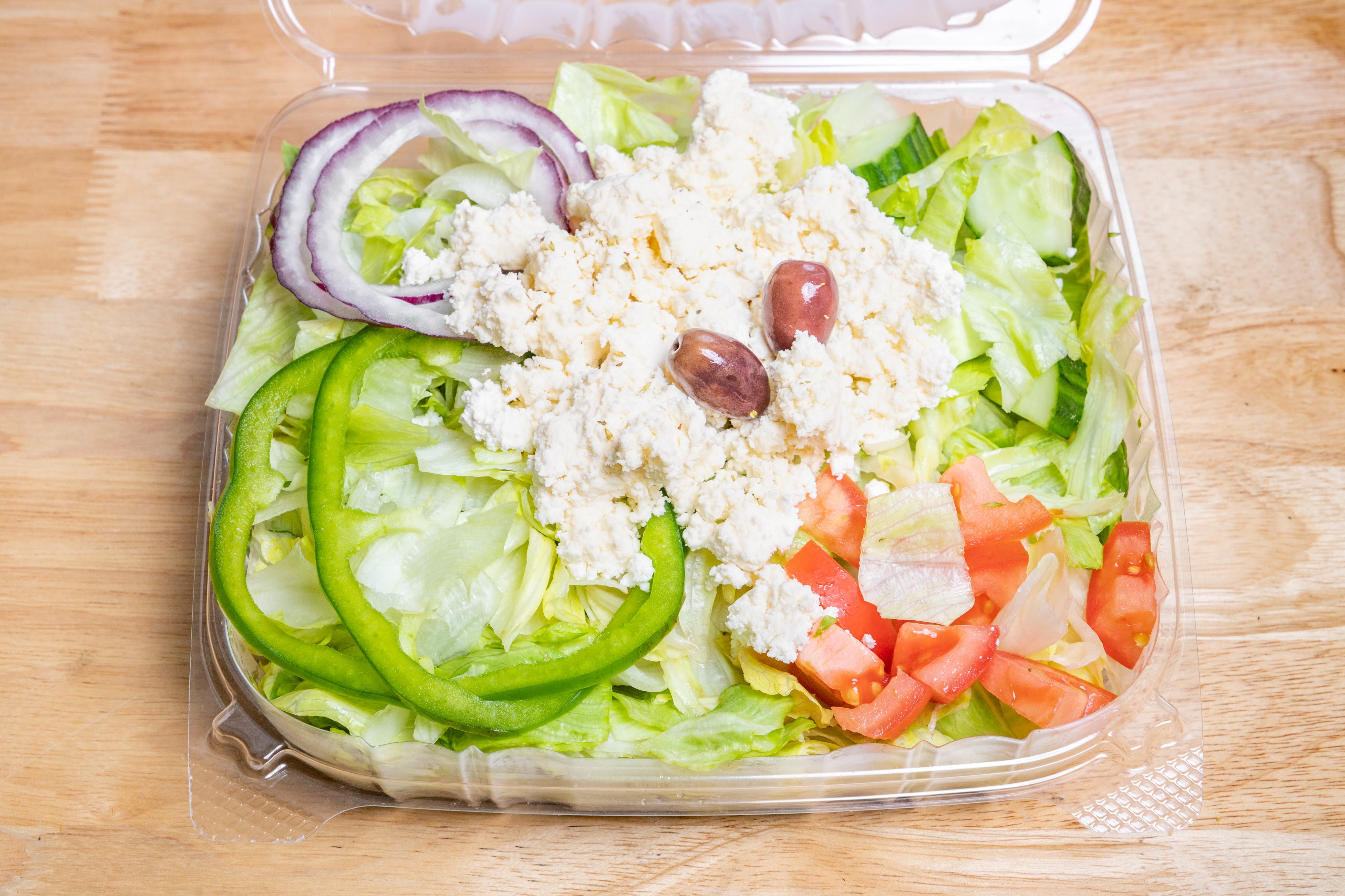 Order Greek Salad - Salad food online from Express Pizza store, Bedford on bringmethat.com