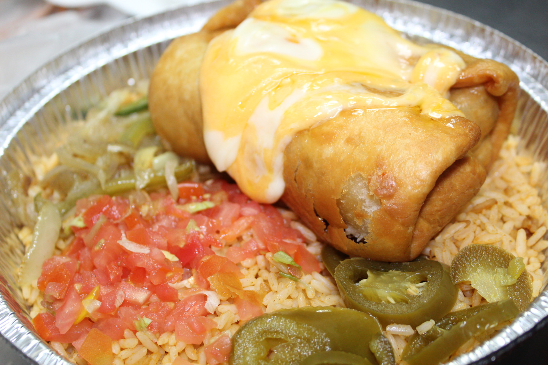 Order E4. Chimichangas food online from Yummy Taco store, Inwood on bringmethat.com