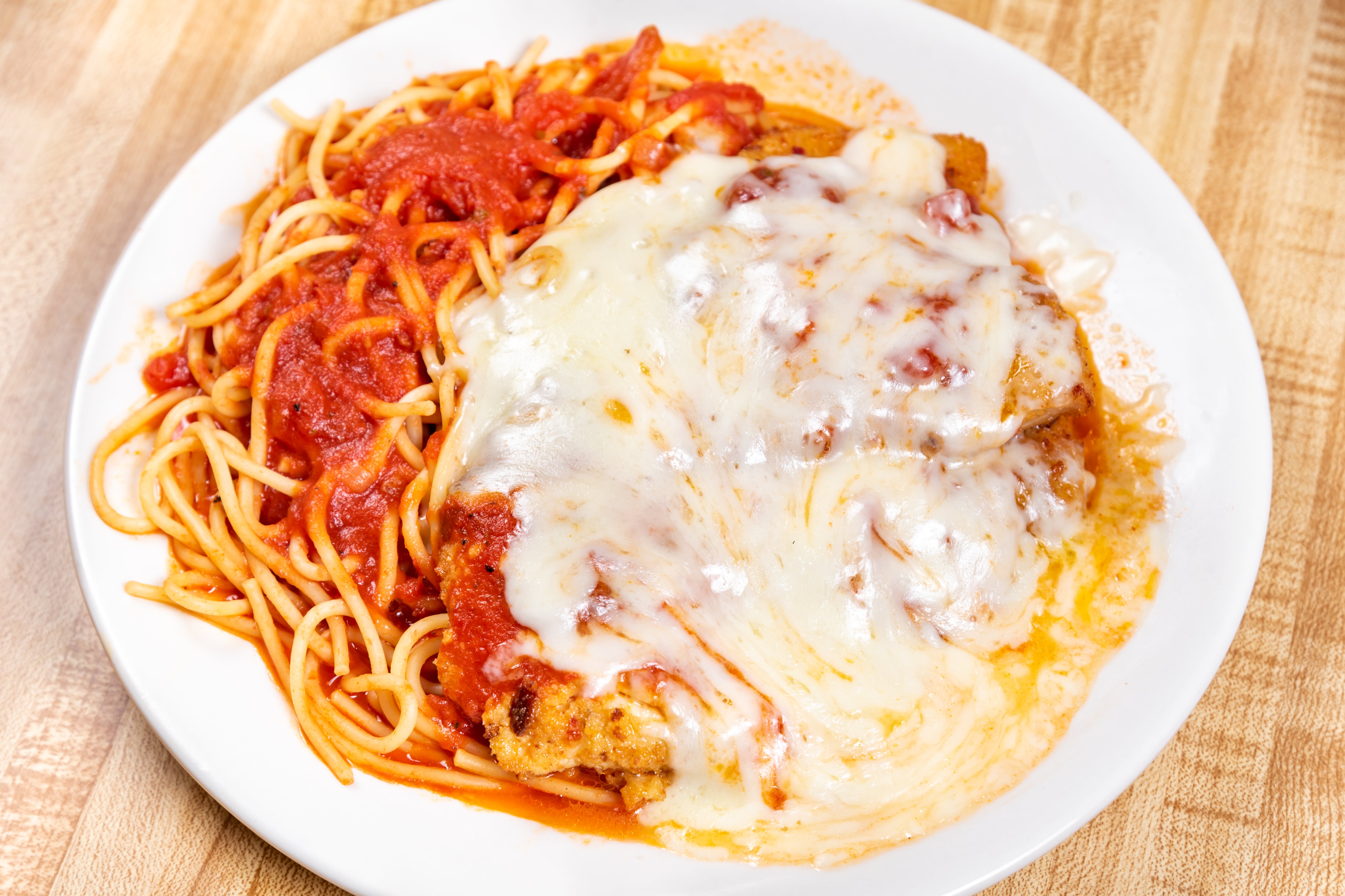 Order Chicken Cutlet Parmigiana - Entree food online from Steinway pizza store, Astoria on bringmethat.com