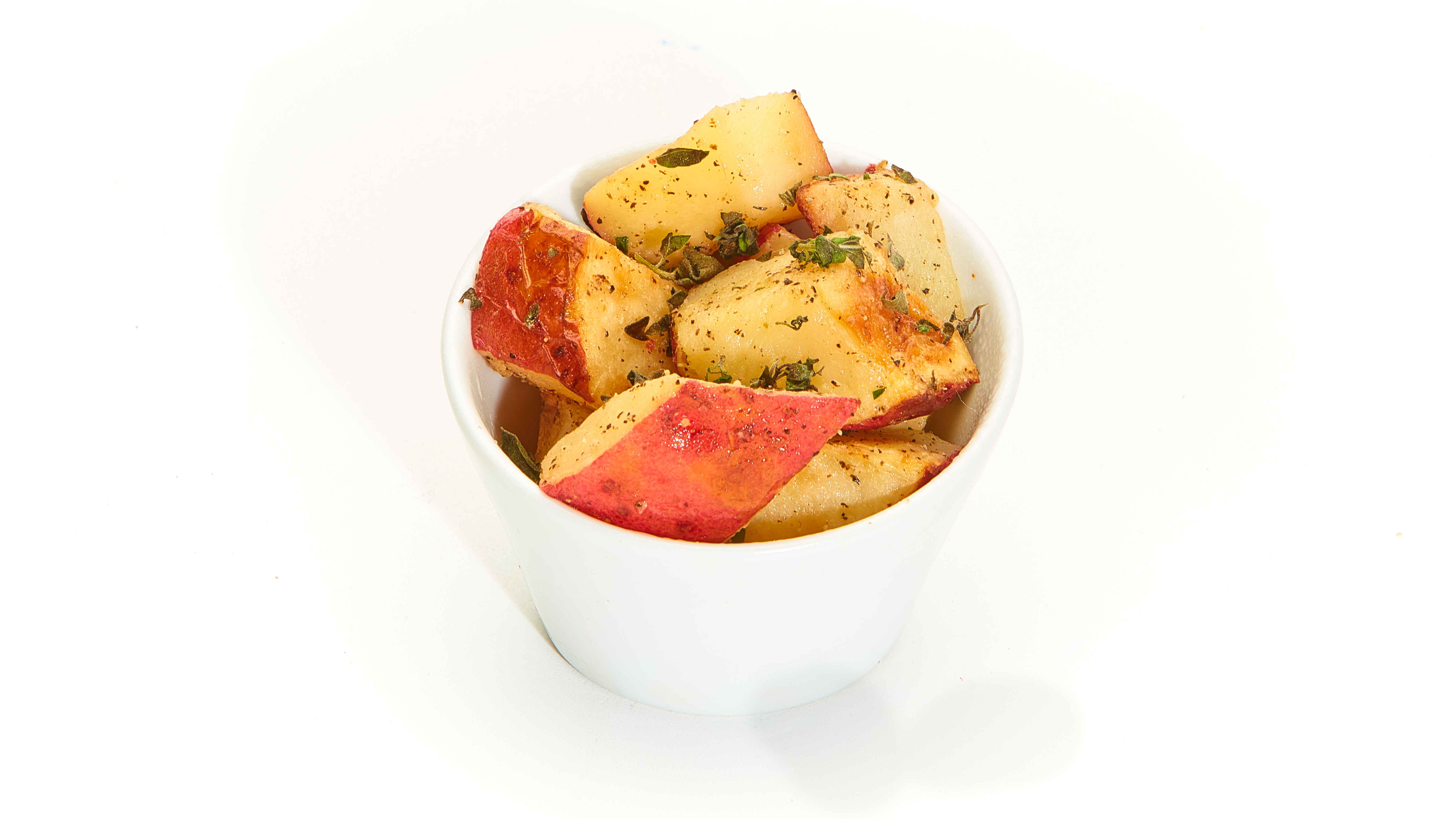 Order Side of Roasted New Potatoes food online from Taziki Cafe store, Tuscaloosa on bringmethat.com