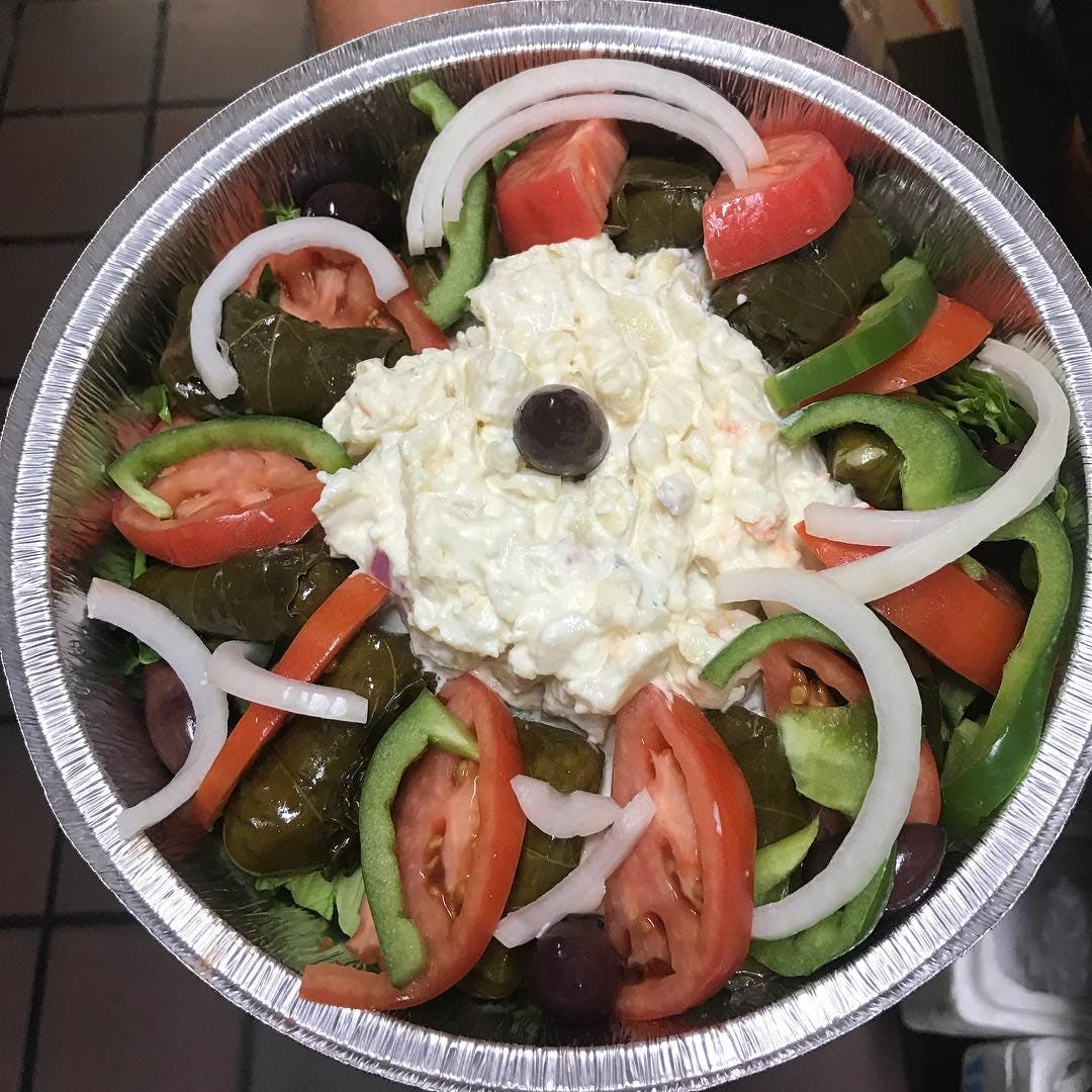 Order Stuffed Grape Leaves - Appetizer food online from Three Brothers Diner store, Hamden on bringmethat.com